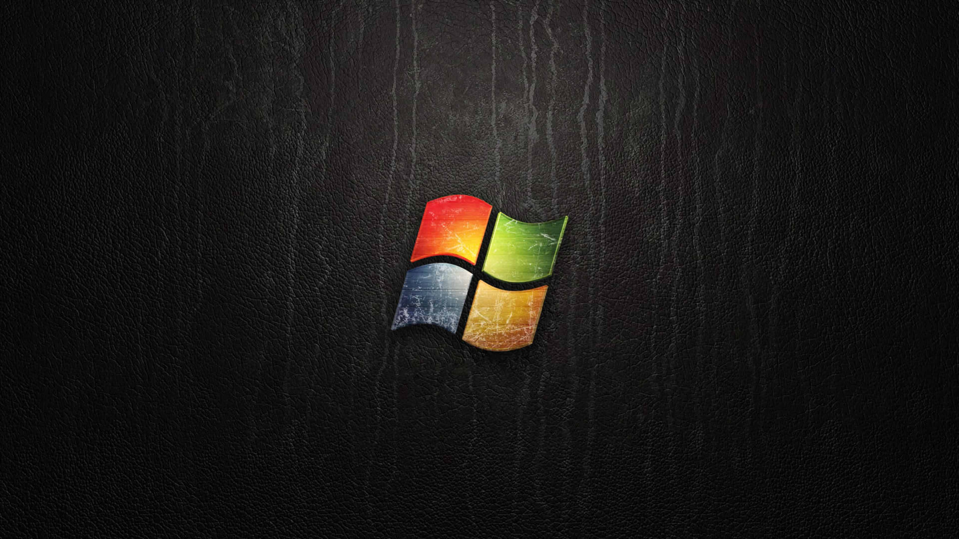 深色皮革紋理背景上的Windows標誌 — Microsoft 壁紙