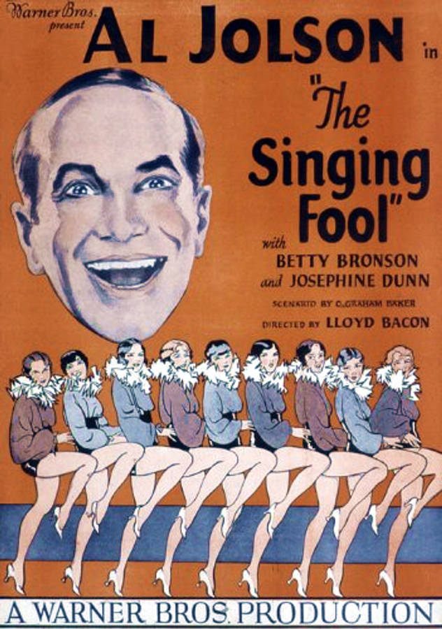 手機 桌布 壁紙 — 1930年代復古電影海報《The Singing Fool》，描繪巨大的微笑阿爾·喬爾森在一排迷人的飛女郎舞者之上。