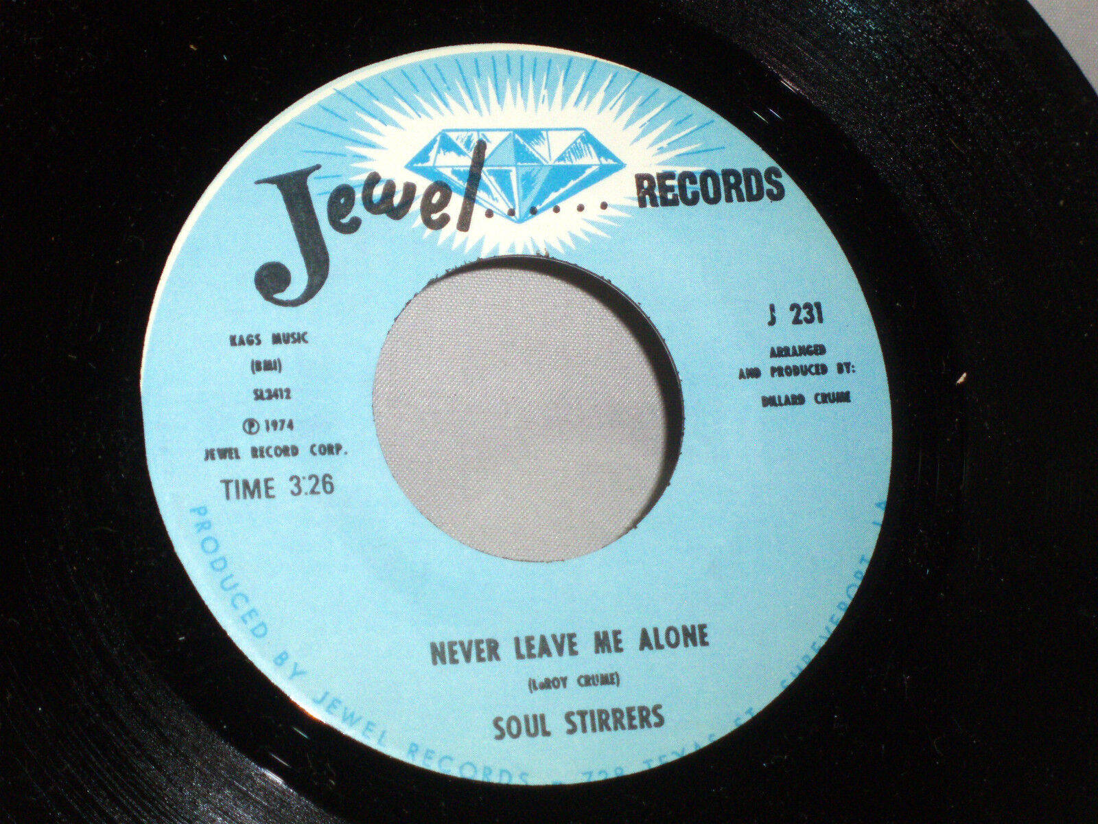 復古 桌布 壁紙 — 1974年Jewel Records為Soul Stirrers的《Never Leave Me Alone》推出的復古45轉黑膠唱片標籤，帶有藍色鑽石標誌和淺藍色背景。