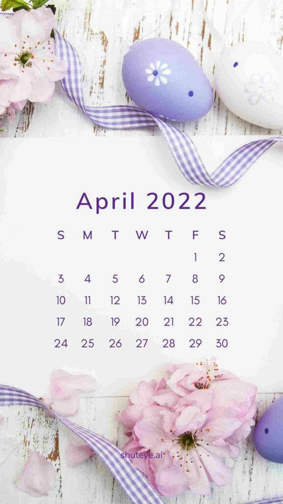 手機 桌布 壁紙 — 2022年4月日曆，以粉彩蛋和粉紅櫻花環繞，置於質樸木面上。
