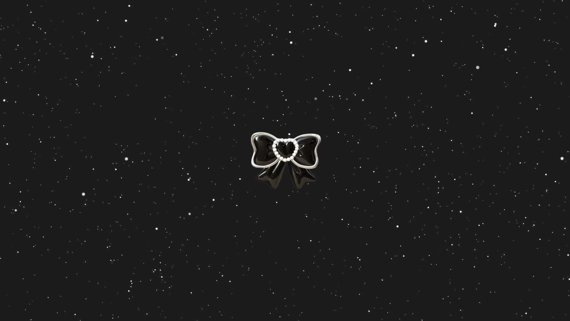  壁紙 — 一個黑色蝴蝶結，中心呈心形，漂浮在繁星點點的夜空。