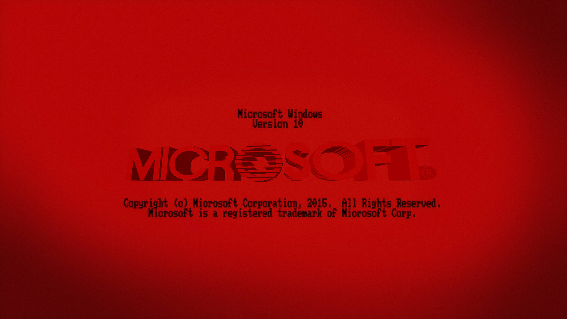 Microsoft Windows 10啟動畫面，紅色背景和黑色文字。 — Windows 11 壁紙