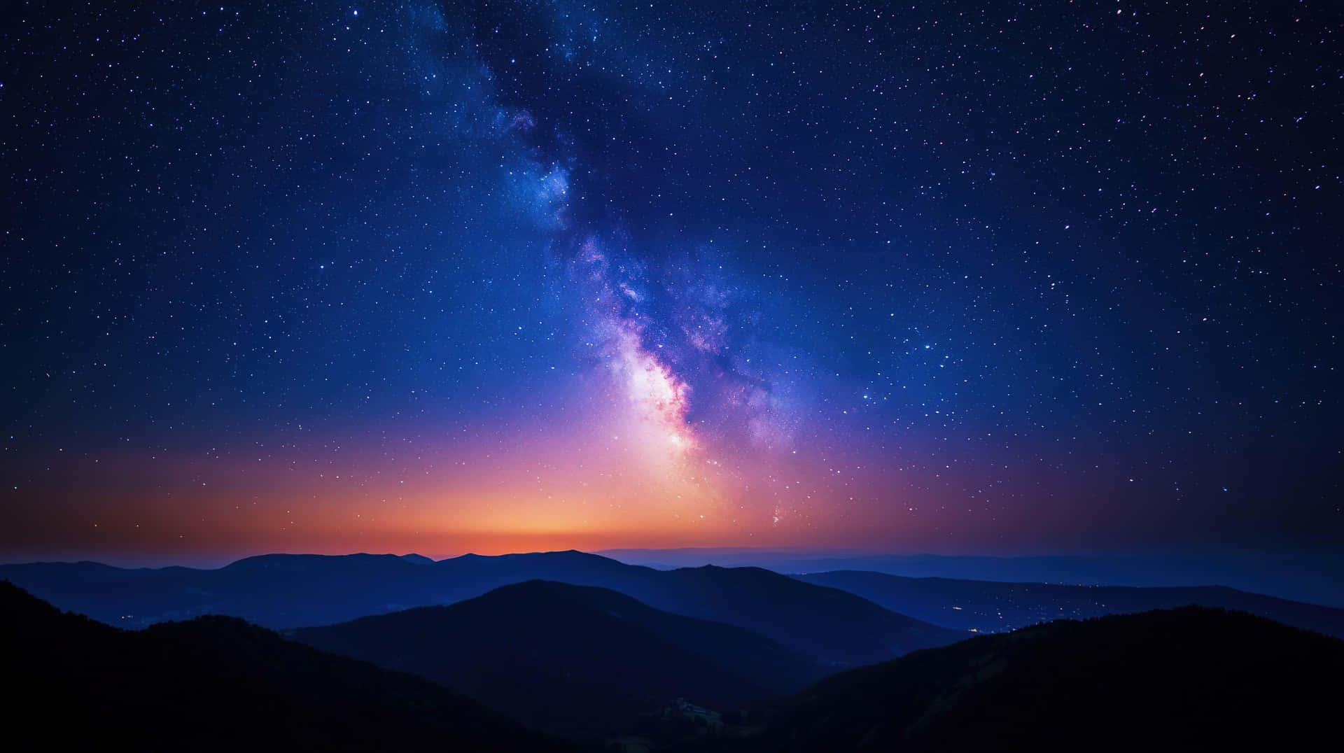 銀河系在星空下彎曲在黑暗的山脈剪影之上。 — 宇宙 壁紙