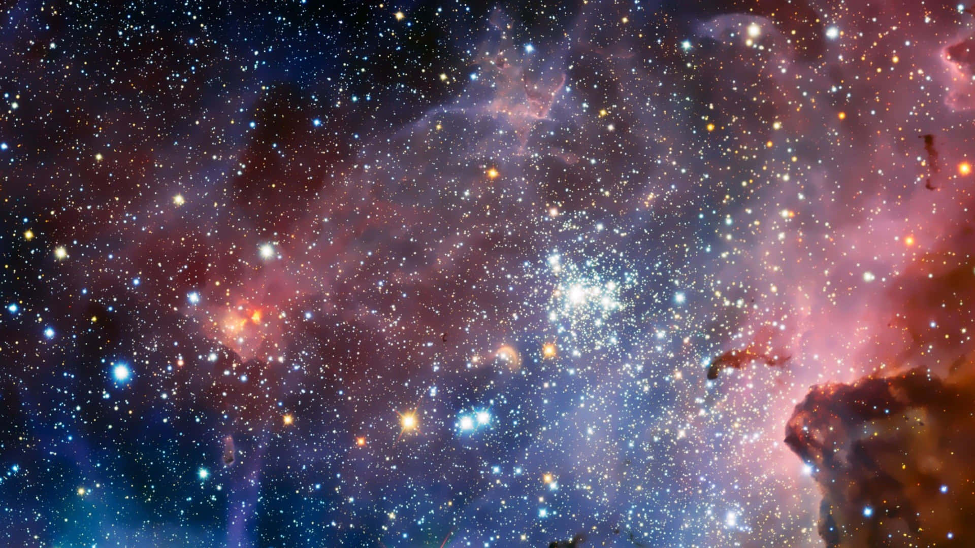 充滿發光恆星和彩色氣體雲的鮮豔宇宙星雲，位於深空。 — 4K 太空 壁紙