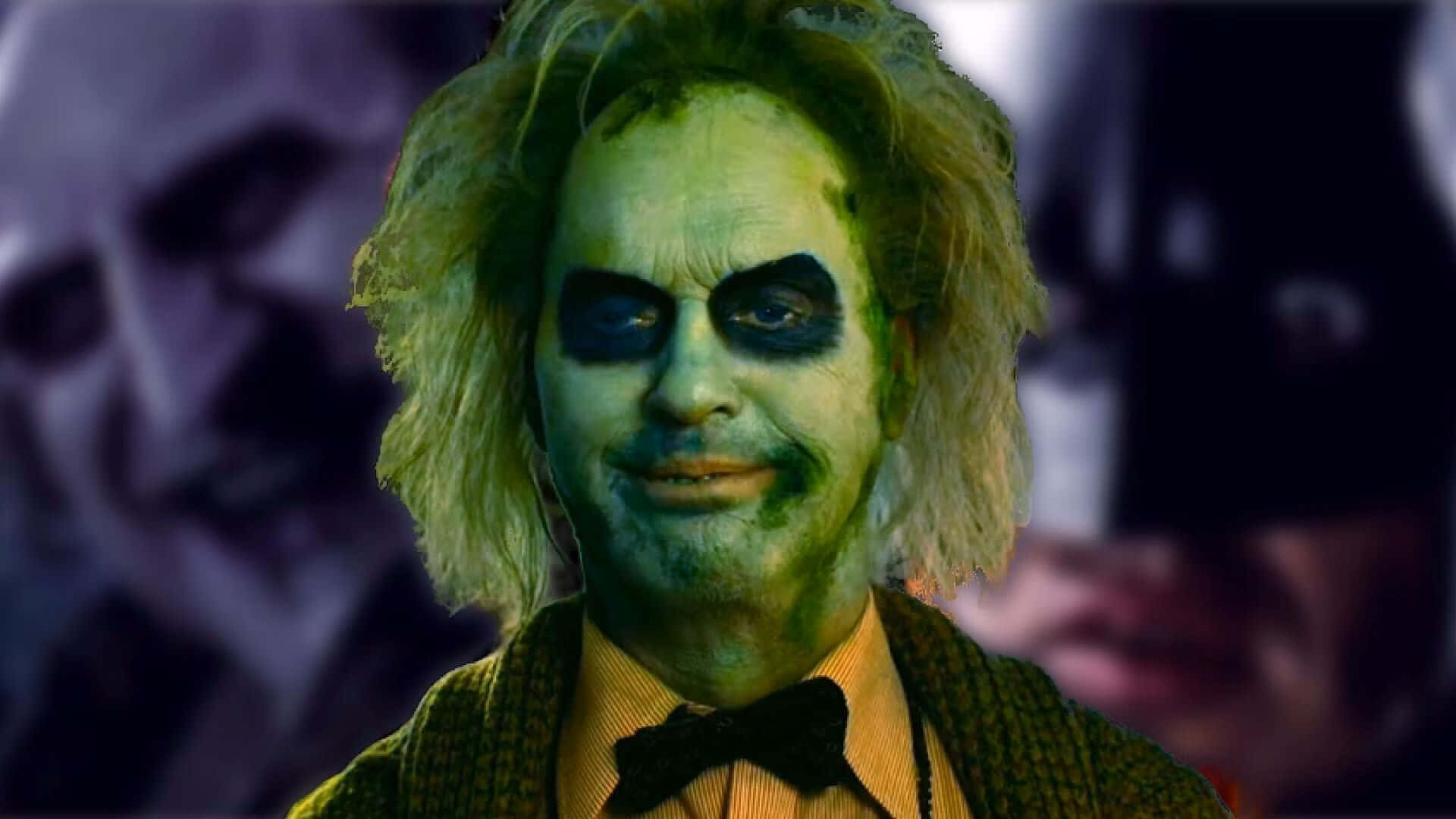  壁紙 — 小丑的近距離特寫，臉上塗有綠色顏料，頭髮凌亂，背景模糊黑暗。