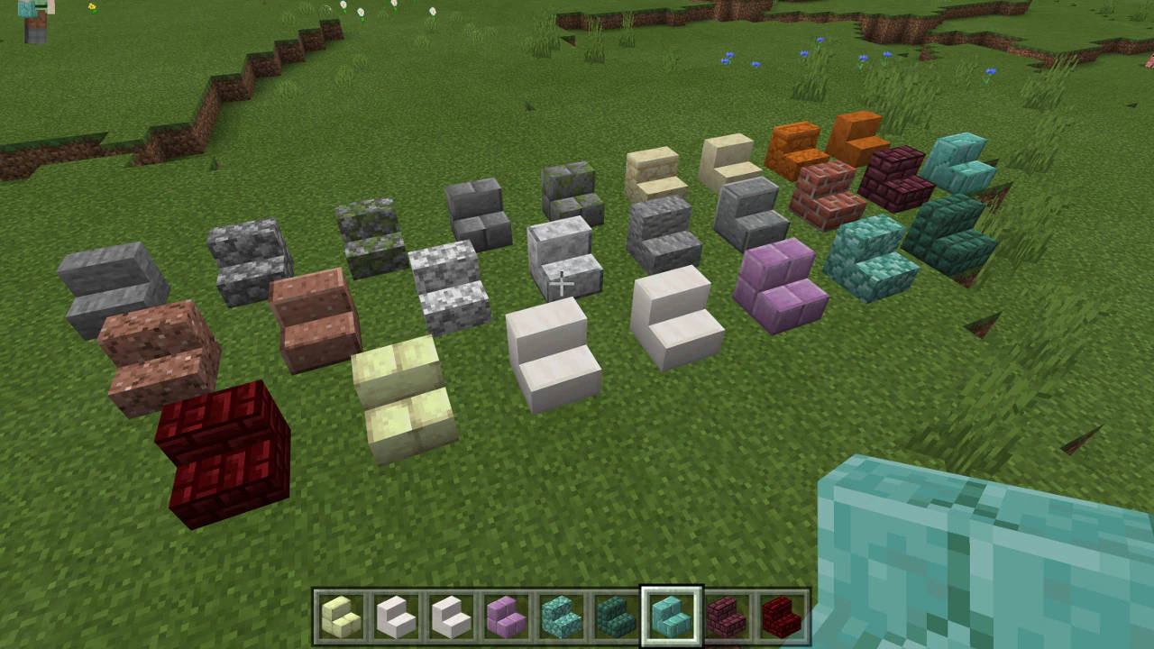 Minecraft方塊排列在草地上，底部有物品欄。 — 1280x720 Minecraft 壁紙 壁紙