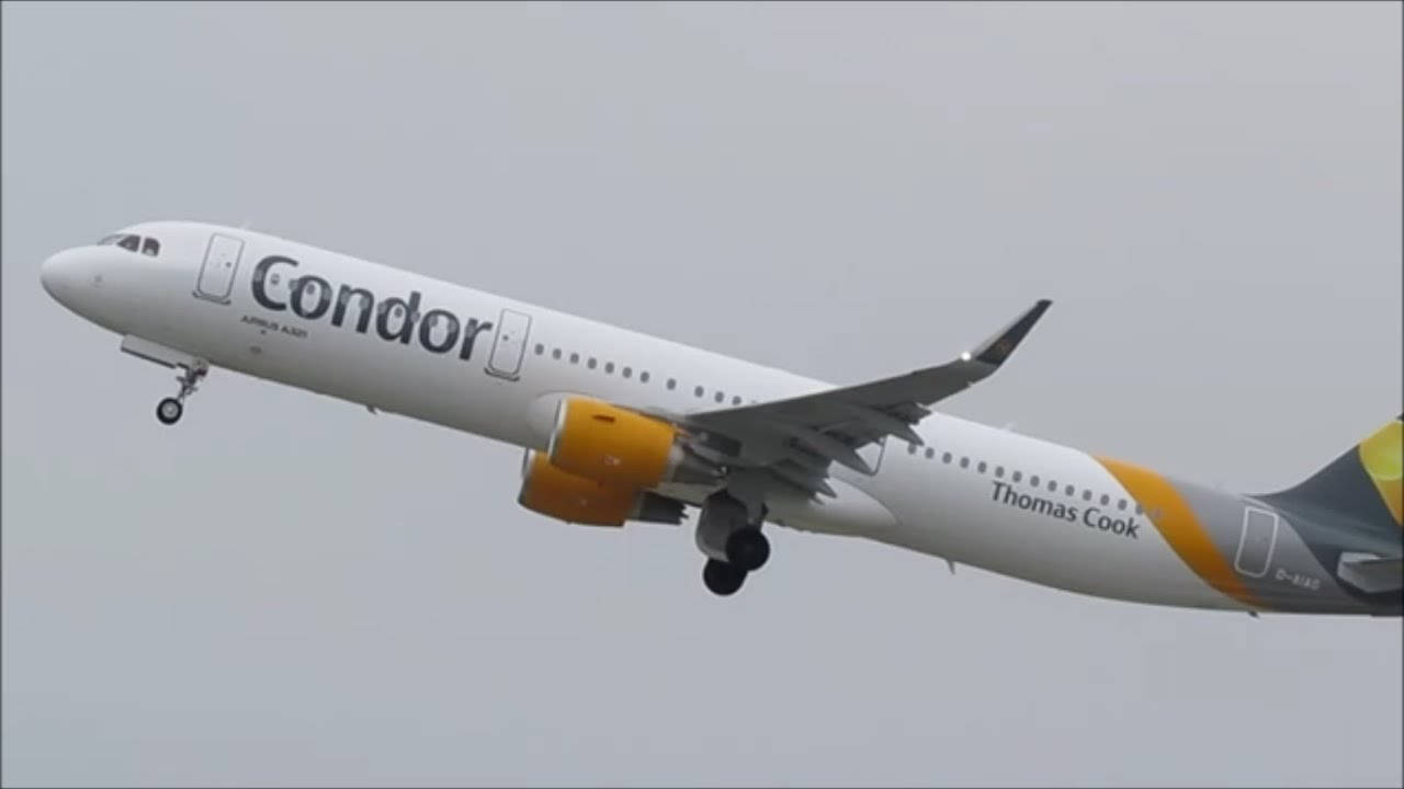 飛機 桌布 壁紙 — Condor Thomas Cook Airbus A320 在灰色天空背景下飛行，起落架放下。