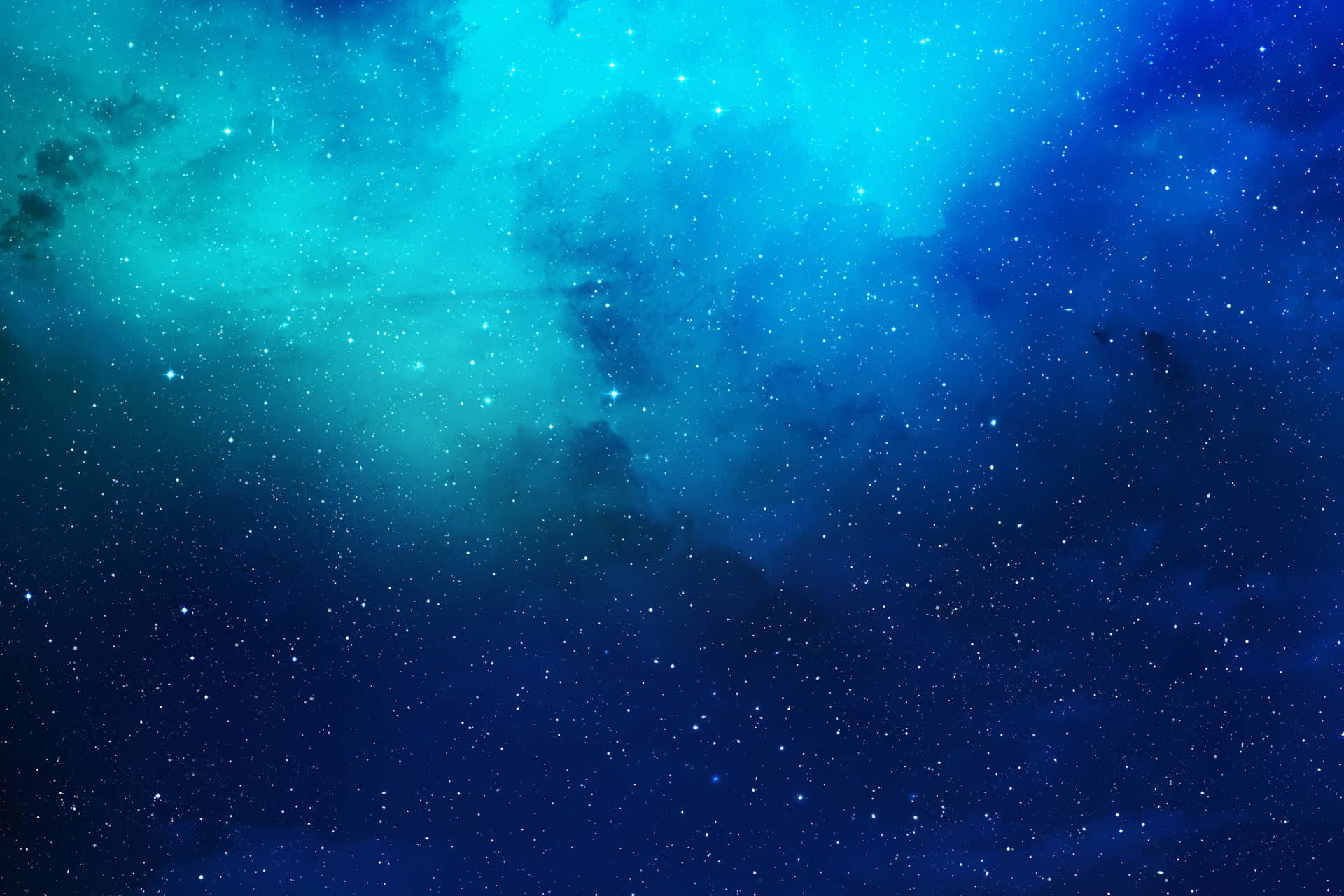  壁紙 — 一個宇宙星雲在充滿活力的青綠色和深藍色色調中旋轉，點綴著無數閃爍的星星。