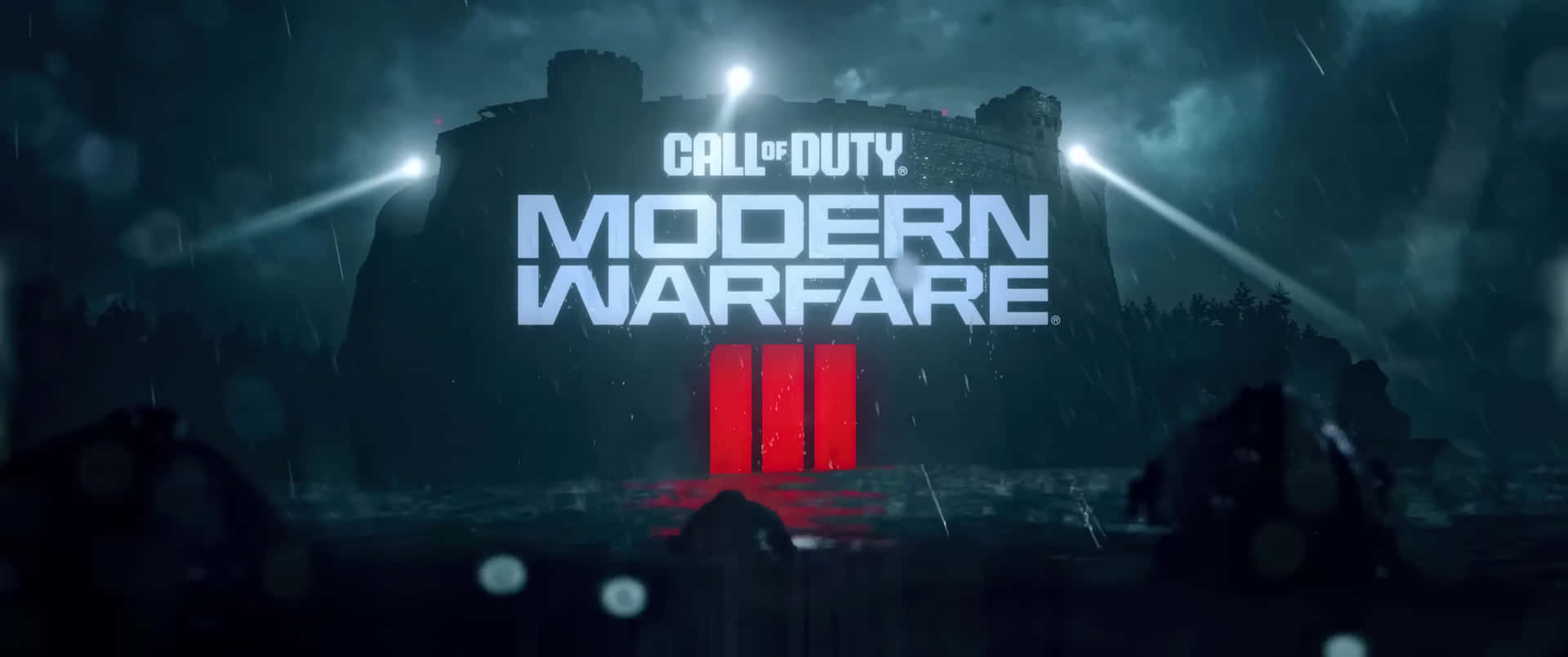  壁紙 — 黑暗風暴中的城堡輪廓聳立在發光的「Call of Duty Modern Warfare III」文字後方，紅色條紋和聚光燈穿透雨水。