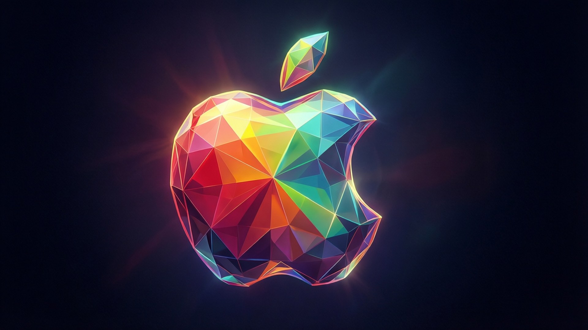 Low-Poly Apple 壁紙 — 一個帶有切割面的彩虹色蘋果標誌在深色背景上發出耀眼的光芒。