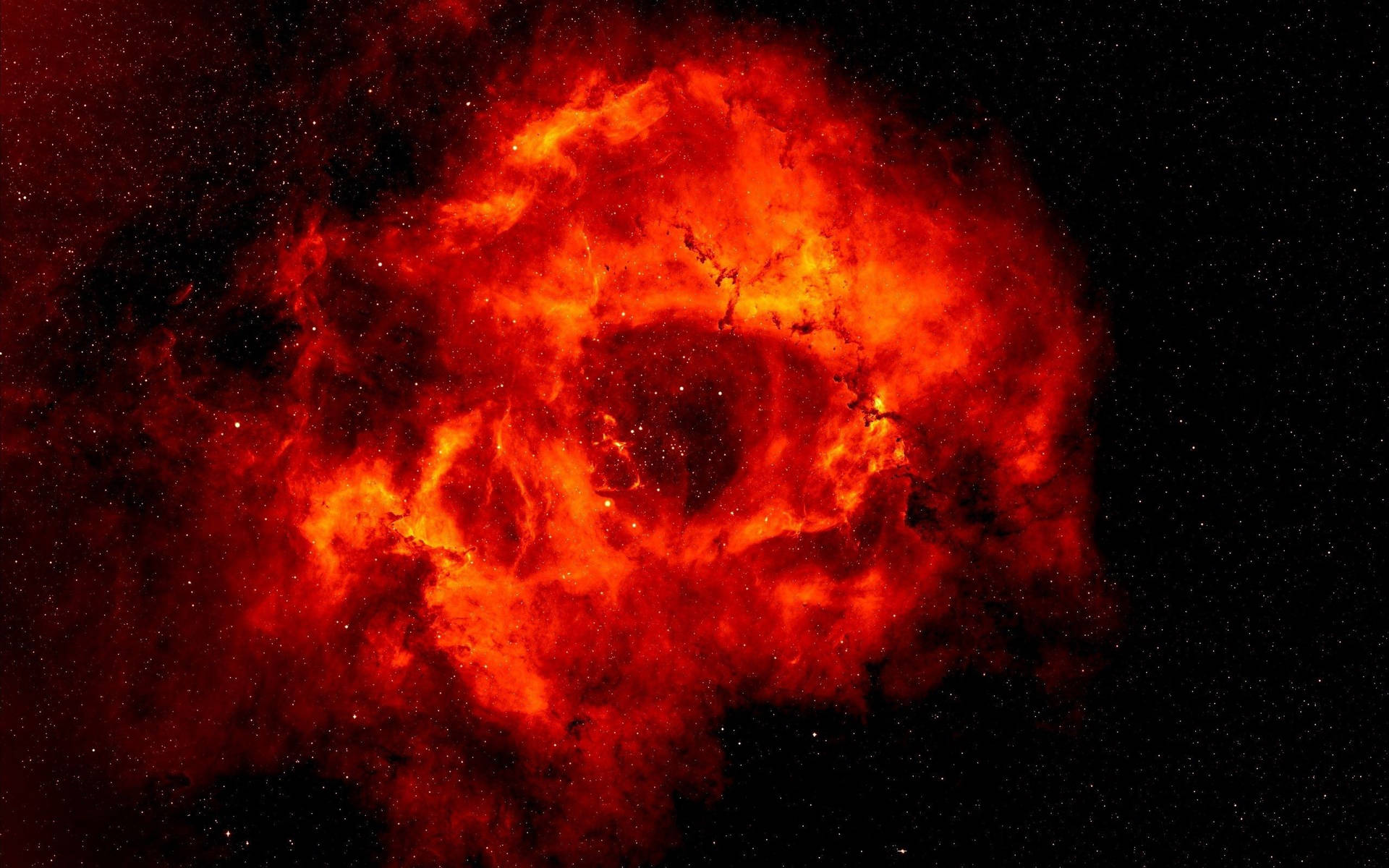 在深空中被星星包圍的鮮豔紅色星雲發光。 — 太空 壁紙