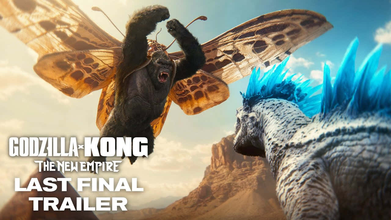 Godzilla X Kong The New Empire 桌布 壁紙 — 一隻擁有飛蛾翅膀的巨猿，在沙漠峽谷背景下，對著一隻背部帶有藍色尖刺的怪物咆哮。