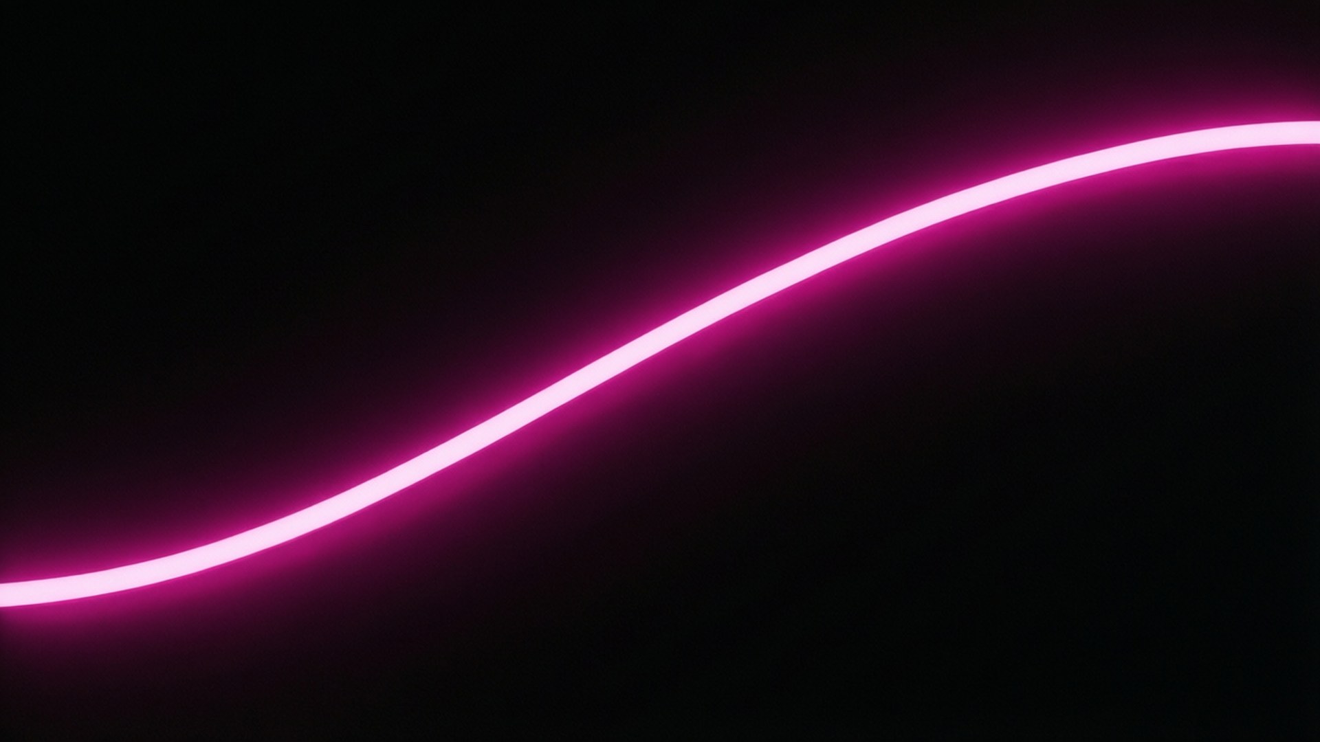 Neon Pink Curve 壁紙 — 一條發光的粉紅色霓虹燈線條在深黑色背景上優雅地彎曲。