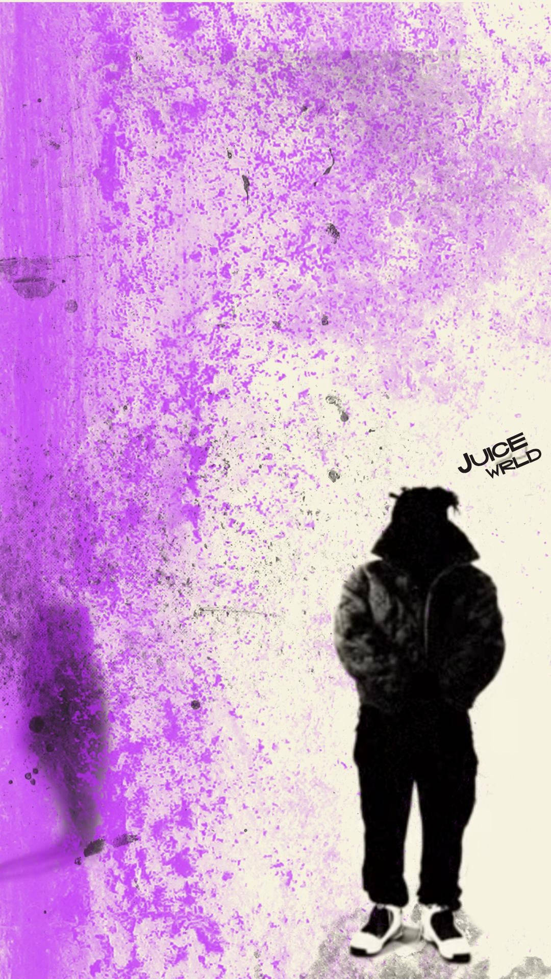 一個穿連帽衫的人站在紫色潑濺背景前，帶有陰影。 — Juice Wrld 壁紙