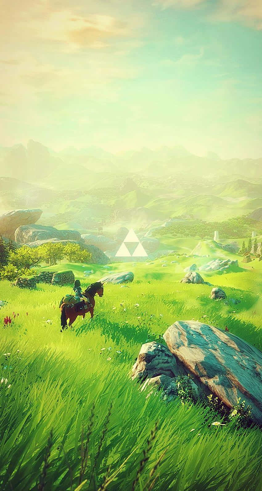一位騎手騎著馬在草地上，遠處有三角力量符號。 — 薩爾達傳說 � Breath of the Wild 壁紙