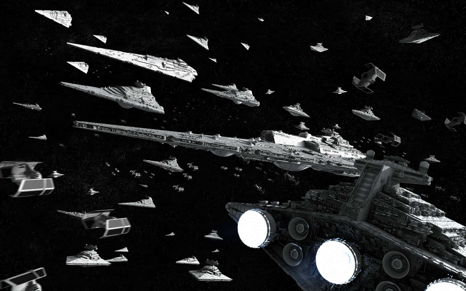  壁紙 — 一艘巨大的星際毀滅者帶領一支星艦艦隊穿過佈滿星辰的虛空，以單色呈現。