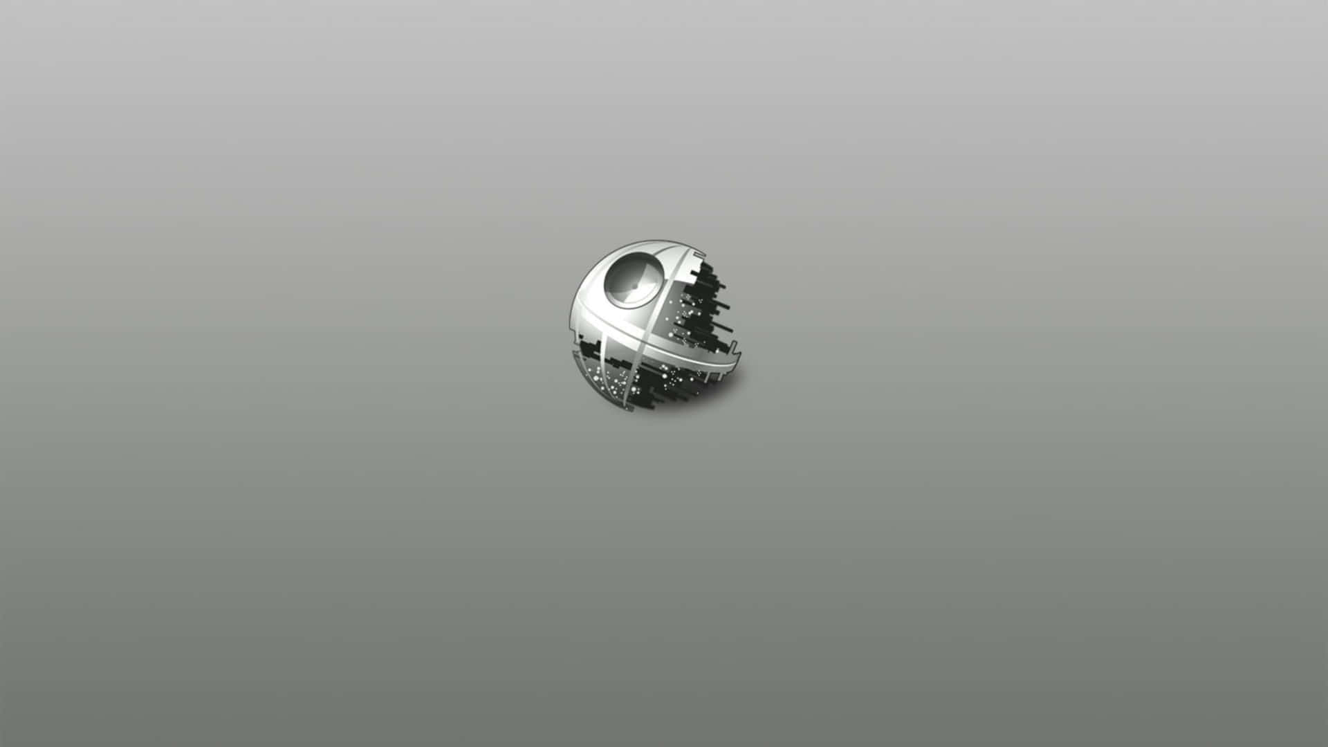  壁紙 — 一個金屬質感的死星圖示漂浮在帶有柔和燈光和微妙陰影的漸變灰色背景上。