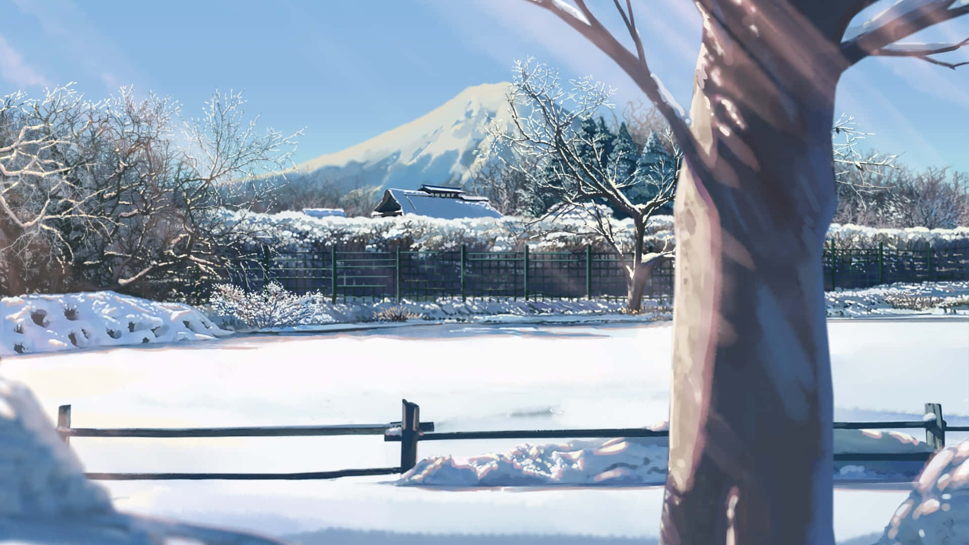  壁紙 — 寧靜的冬日景象，白雪覆蓋的地面，光禿的樹木，以及遠處在清澈藍天下白雪皚皚的山峰。