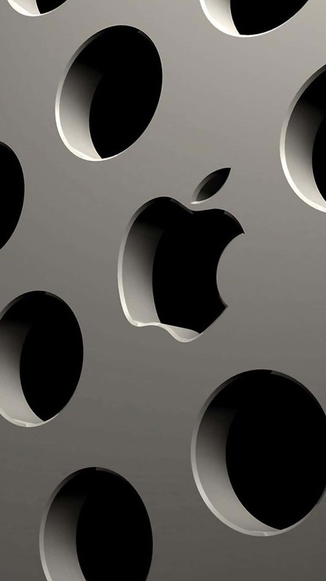 帶有圓孔和Apple標誌鏤空的金屬表面。 — iPhone X 壁紙