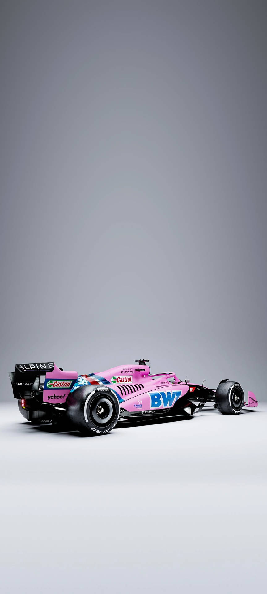 粉紅色和黑色一級方程式賽車在攝影棚中，帶有贊助商標誌 — F1 壁紙