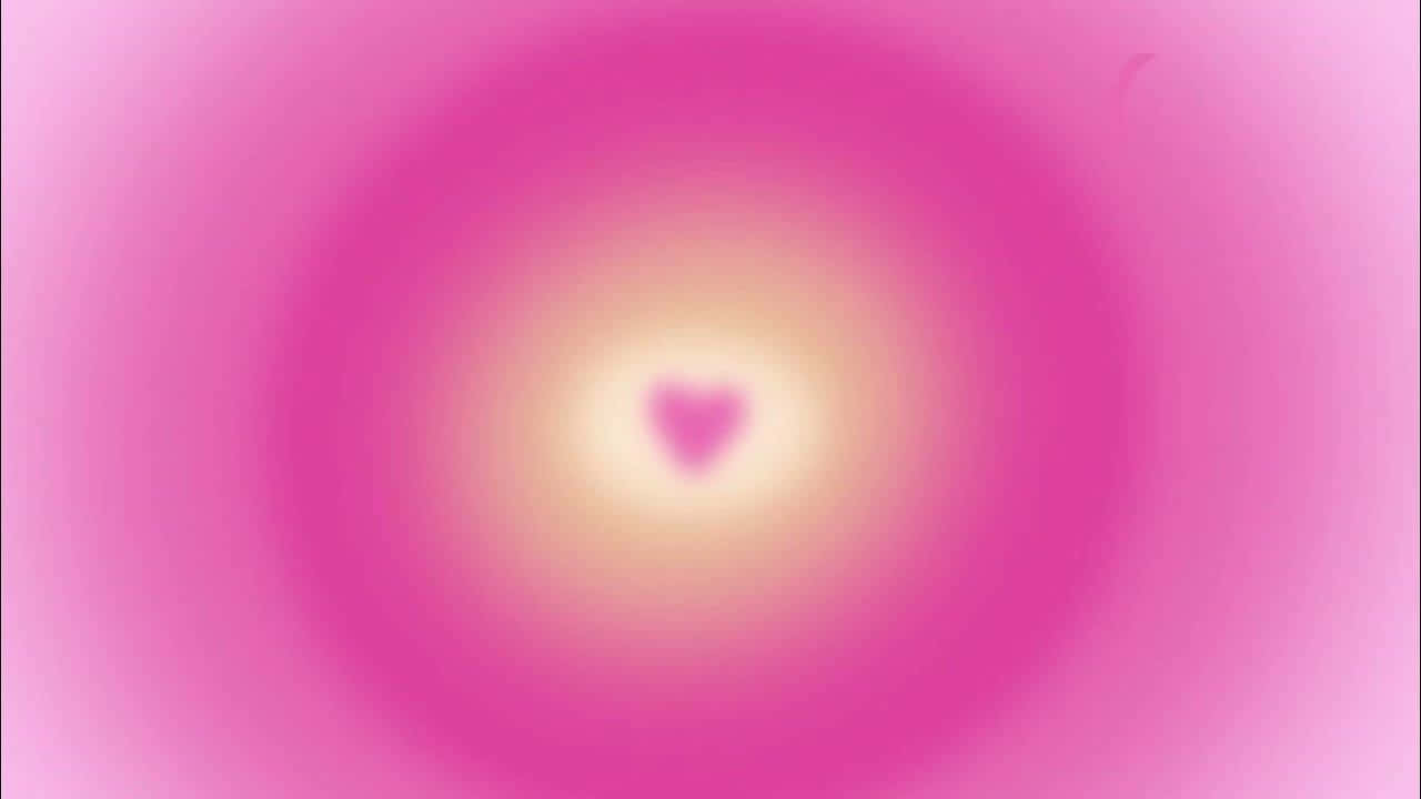  壁紙 — 柔和粉紅色漸變從中心發光的心形向外擴散，營造出夢幻般的抽象光環。