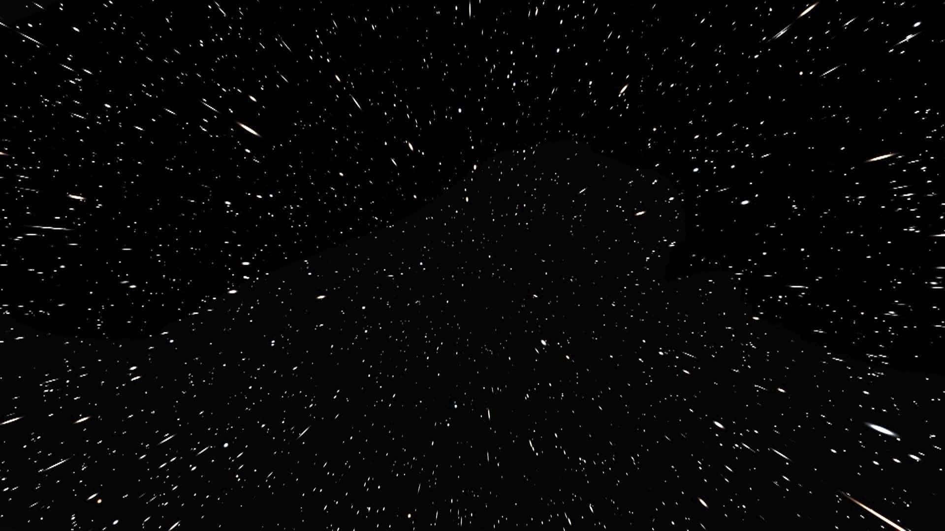  壁紙 — 星場在高速太空旅程中掠過深邃的黑色宇宙。