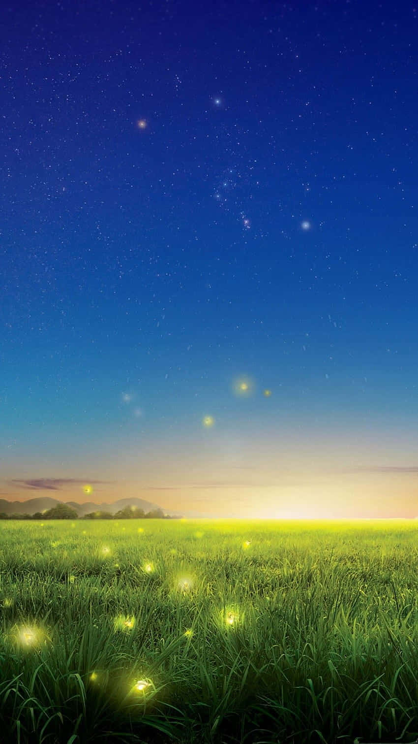  壁紙 — 繁星點點的暮色天空在點綴著螢火蟲的草地上方閃耀。