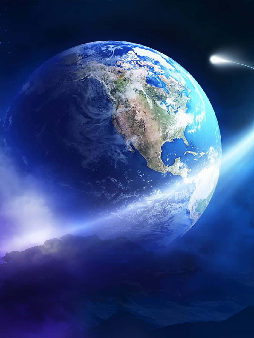  壁紙 — 從太空看到地球的壯麗景色，一顆明亮的彗星在深藍色宇宙背景下劃過。
