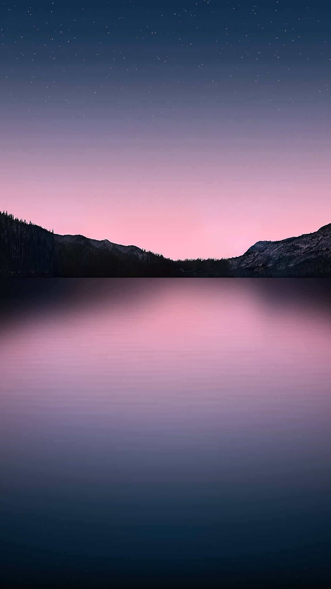  壁紙 — 一個寧靜的湖泊映照著繁星點點的暮色天空，塗上柔和粉紅和深藍色調，輪廓分明的山脈框住了地平線。