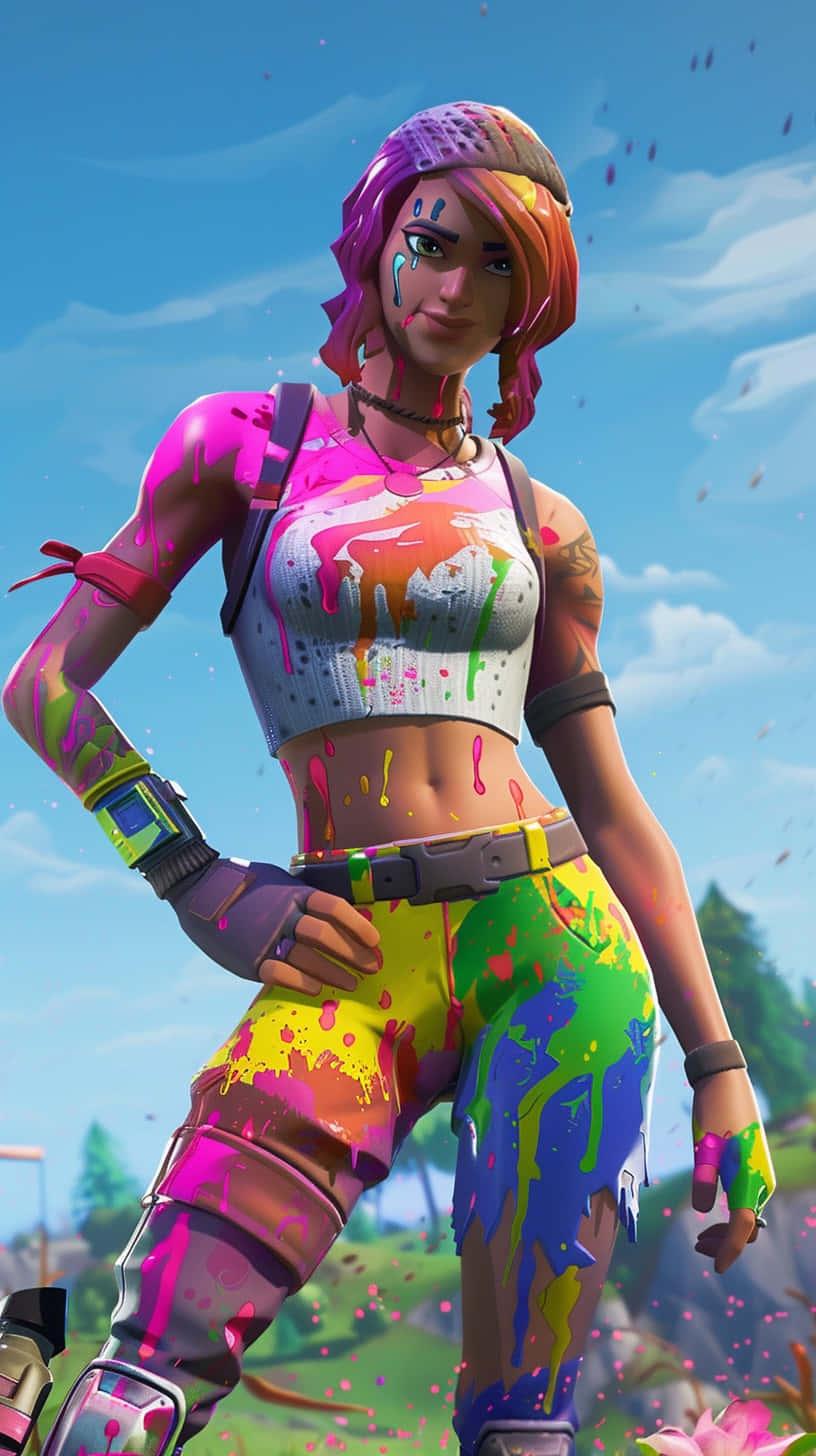  壁紙 — 一個充滿活力的Fortnite角色，身上濺滿彩虹顏料，自信地站在明亮的藍天下。