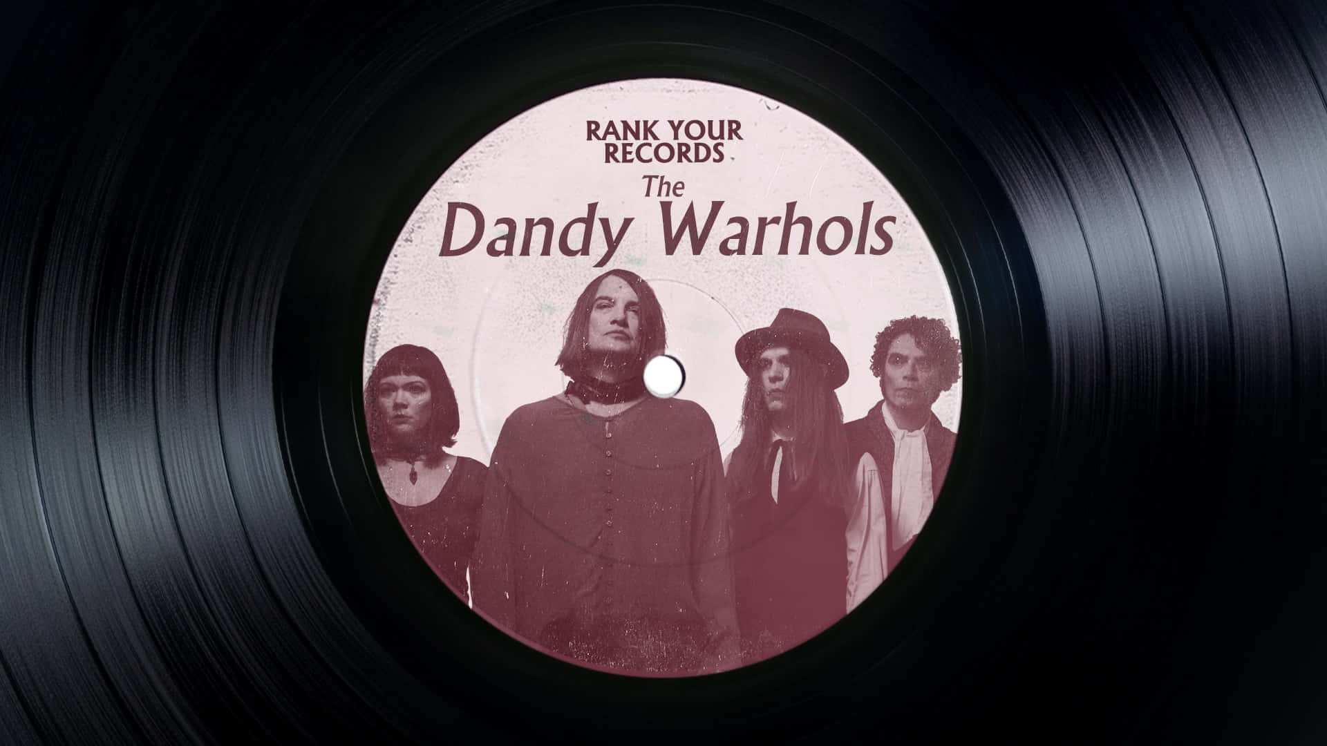  壁紙 — 一張復古黑膠唱片標籤， featuring 樂團 The Dandy Warhols，並附有四名成員的懷舊棕色調照片。