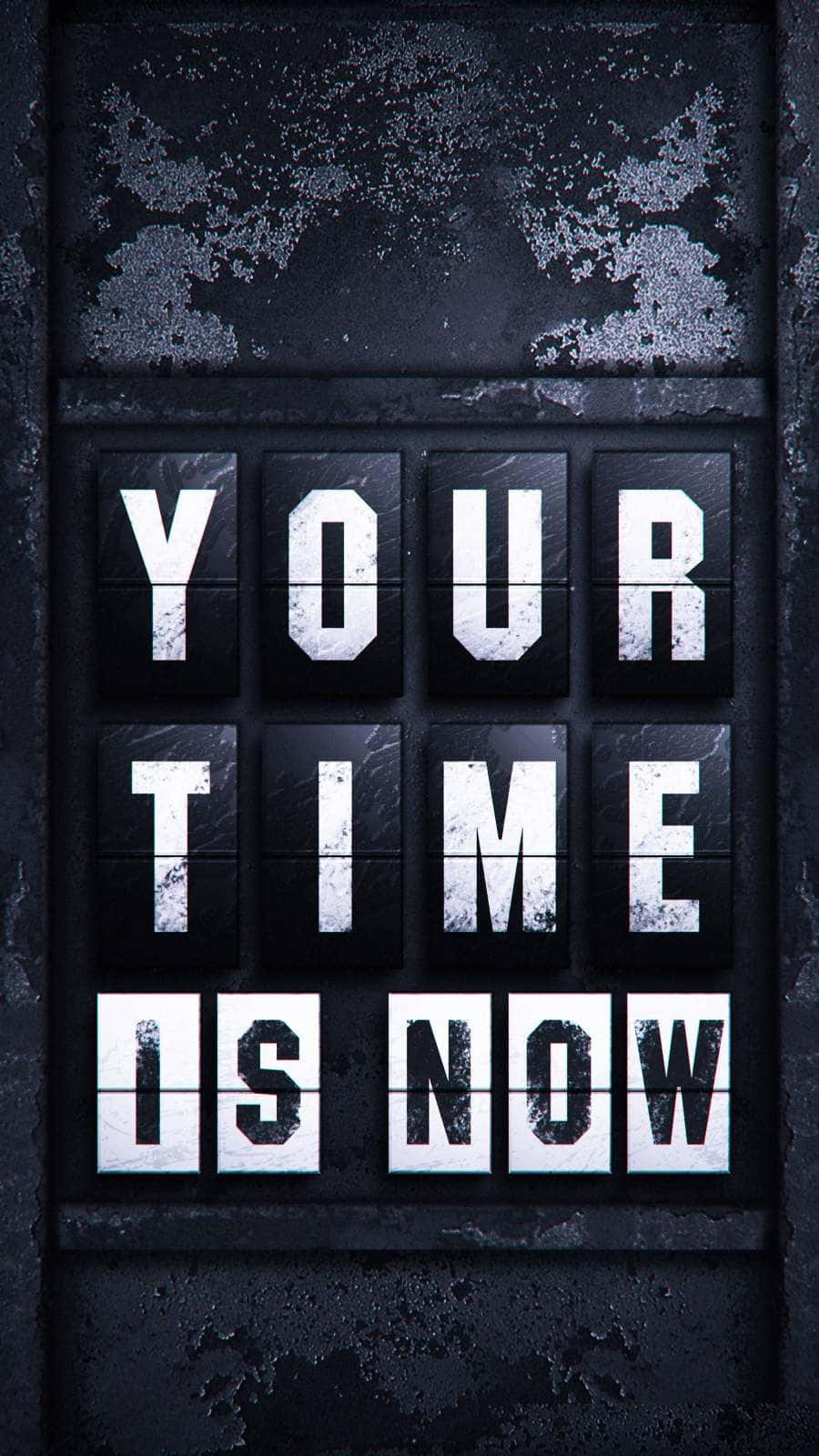  壁紙 — 一個風化的黑色機械標誌，上面有粗體白色字母寫著「YOUR TIME IS NOW」，背景粗糙有紋理。