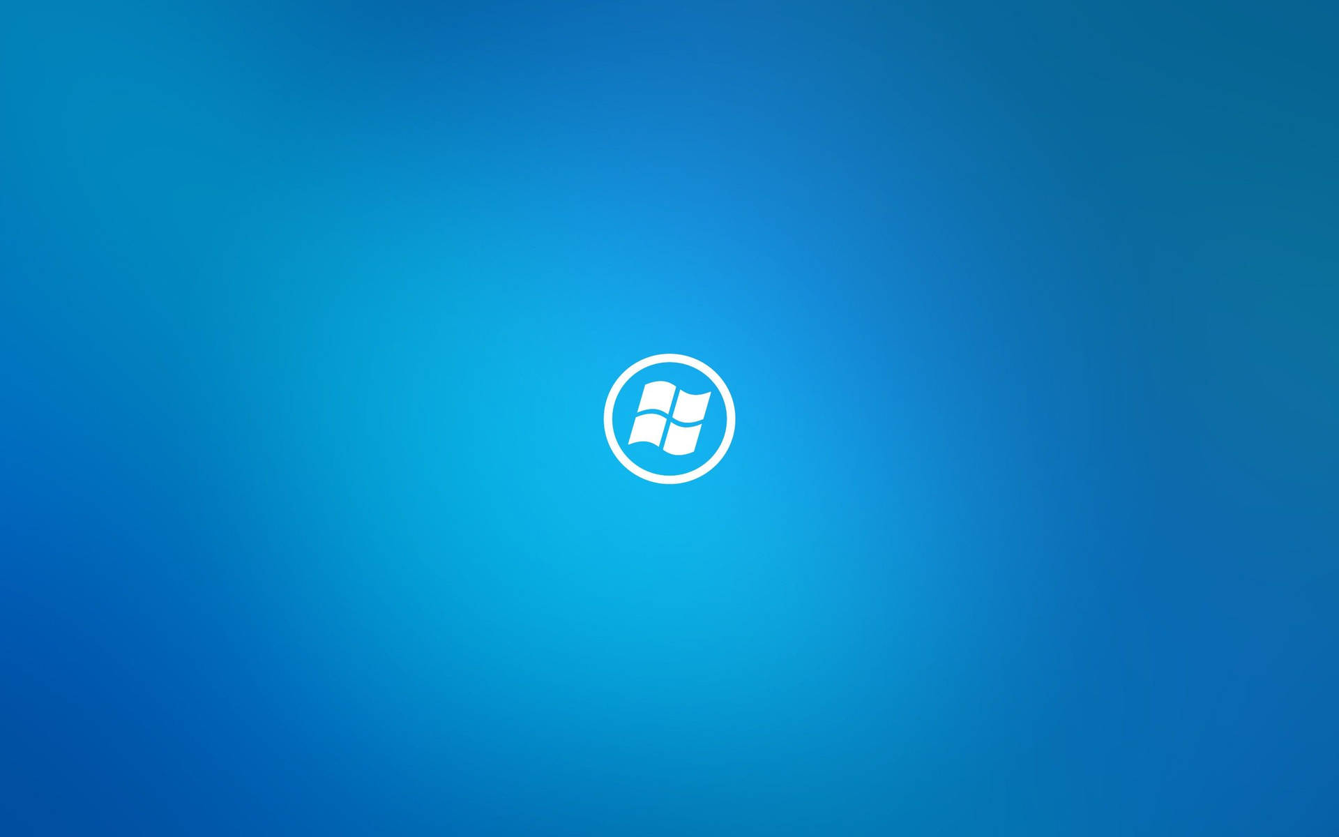 Windows標誌在藍色漸變背景上 — Windows 11 壁紙