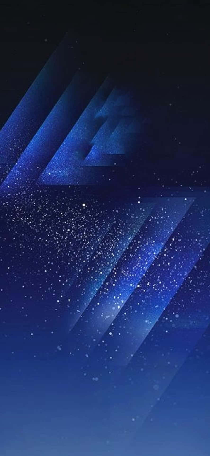 在黑暗的宇宙場景中，藍色幾何形狀帶有閃爍的粒子。 — iPhone 13 壁紙