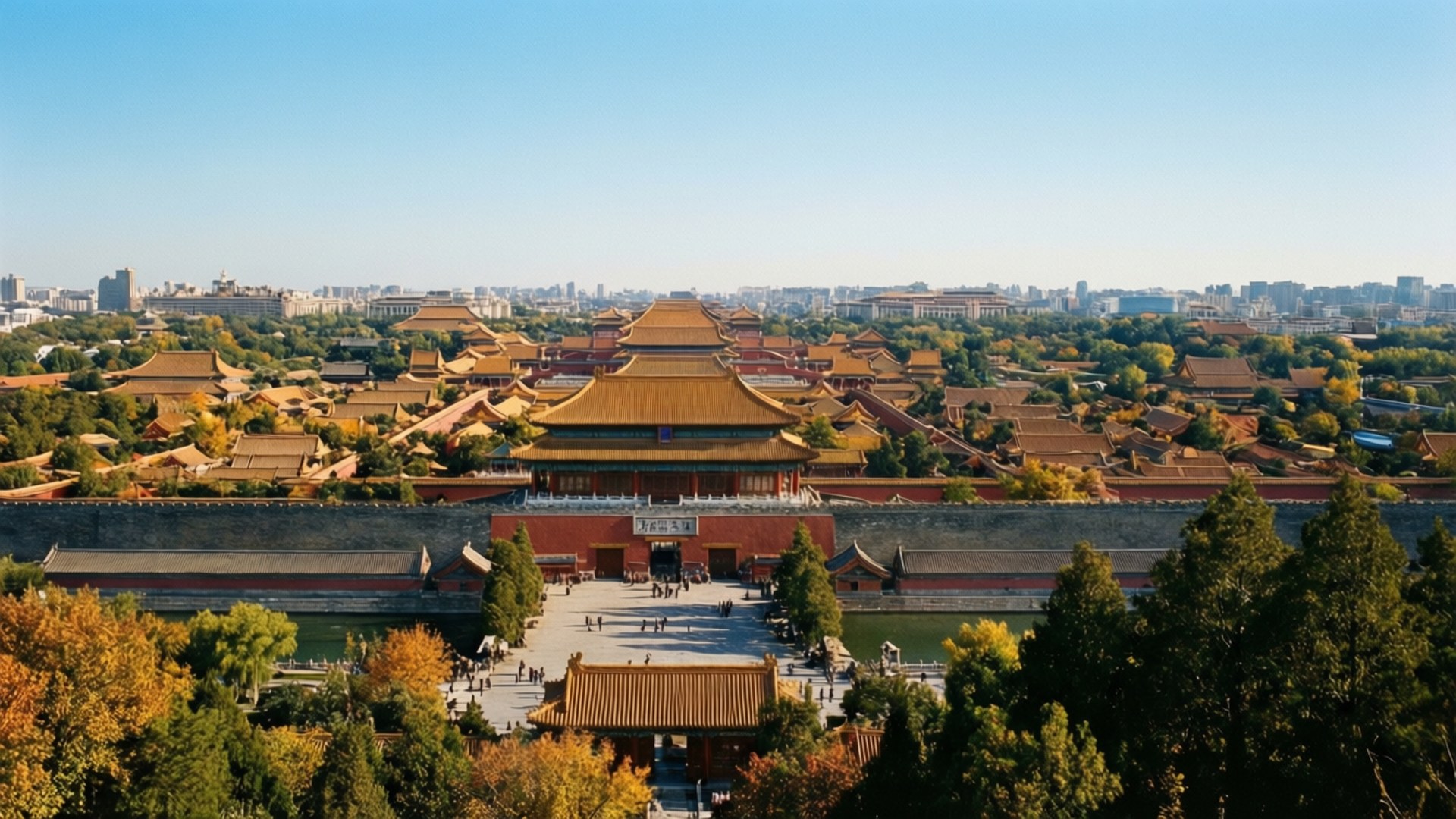 北京 桌布 壁紙 — 紫禁城的鳥瞰圖，金色屋頂和紅色城牆被秋天的樹木環繞，在清澈的藍天下。