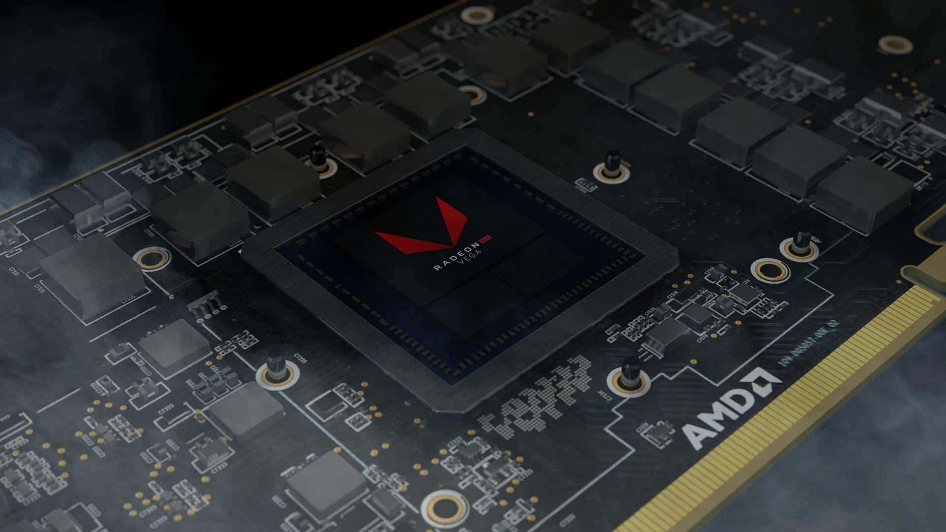AMD 桌布 壁紙 — AMD Radeon 顯示卡特寫，帶有發光的紅色標誌和複雜電路，在戲劇性燈光下。