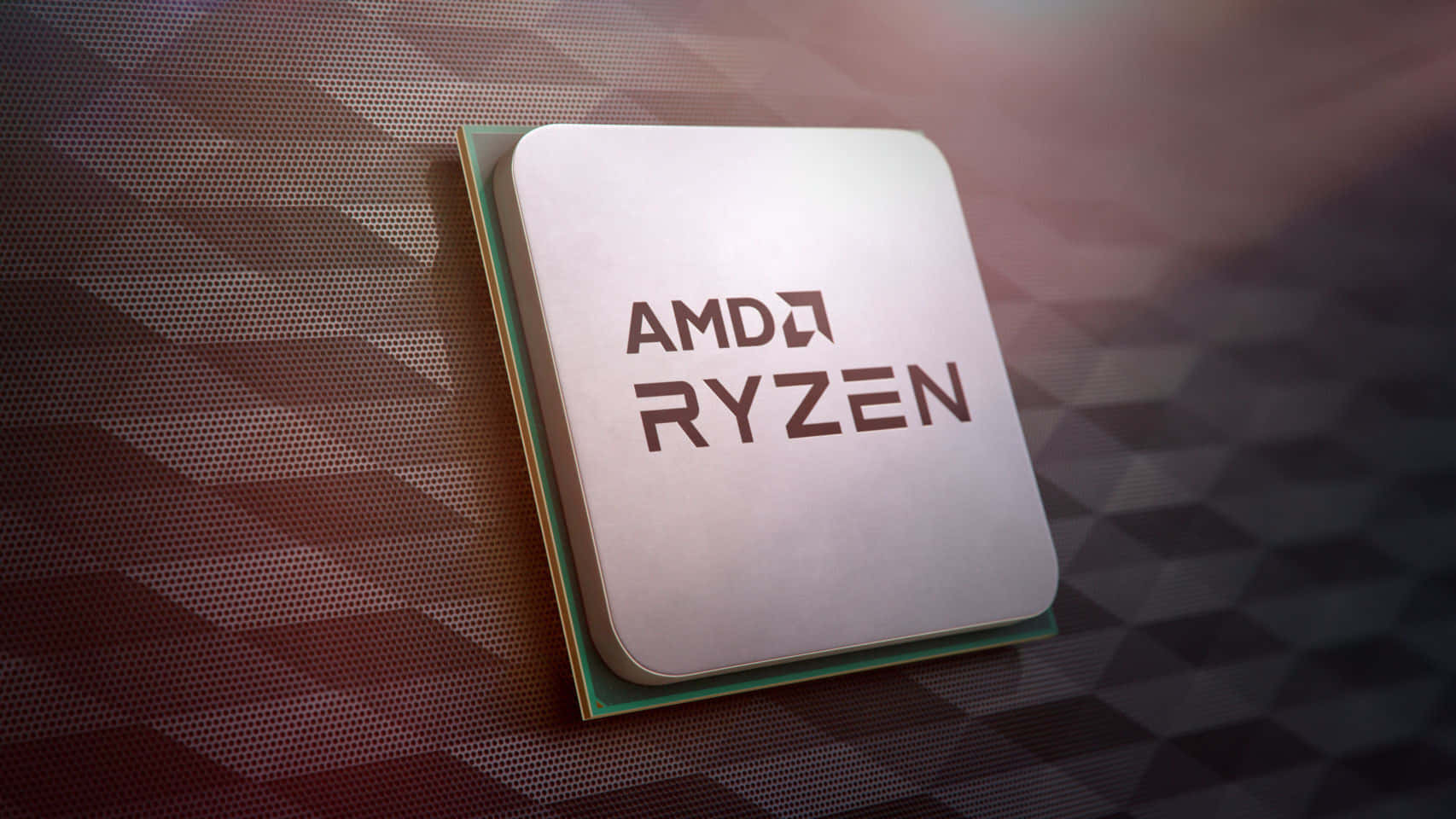 AMD 桌布 壁紙 — AMD Ryzen CPU 晶片特寫，置於幾何圖案表面，配以溫暖燈光。