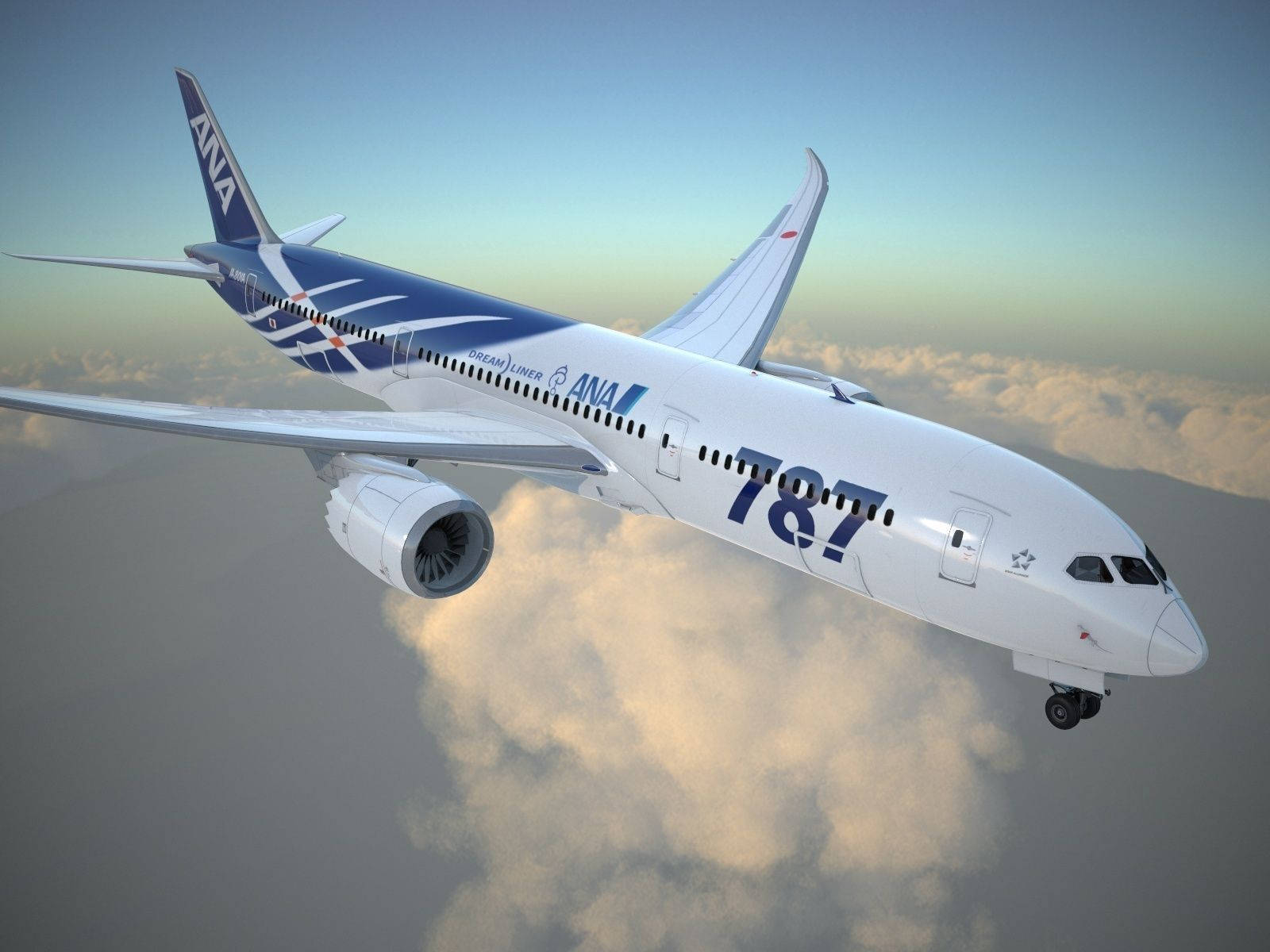 飛機 桌布 壁紙 — ANA Boeing 787 Dreamliner 在柔和的金色日落天空下，優雅地翱翔於蓬鬆的雲層之上。