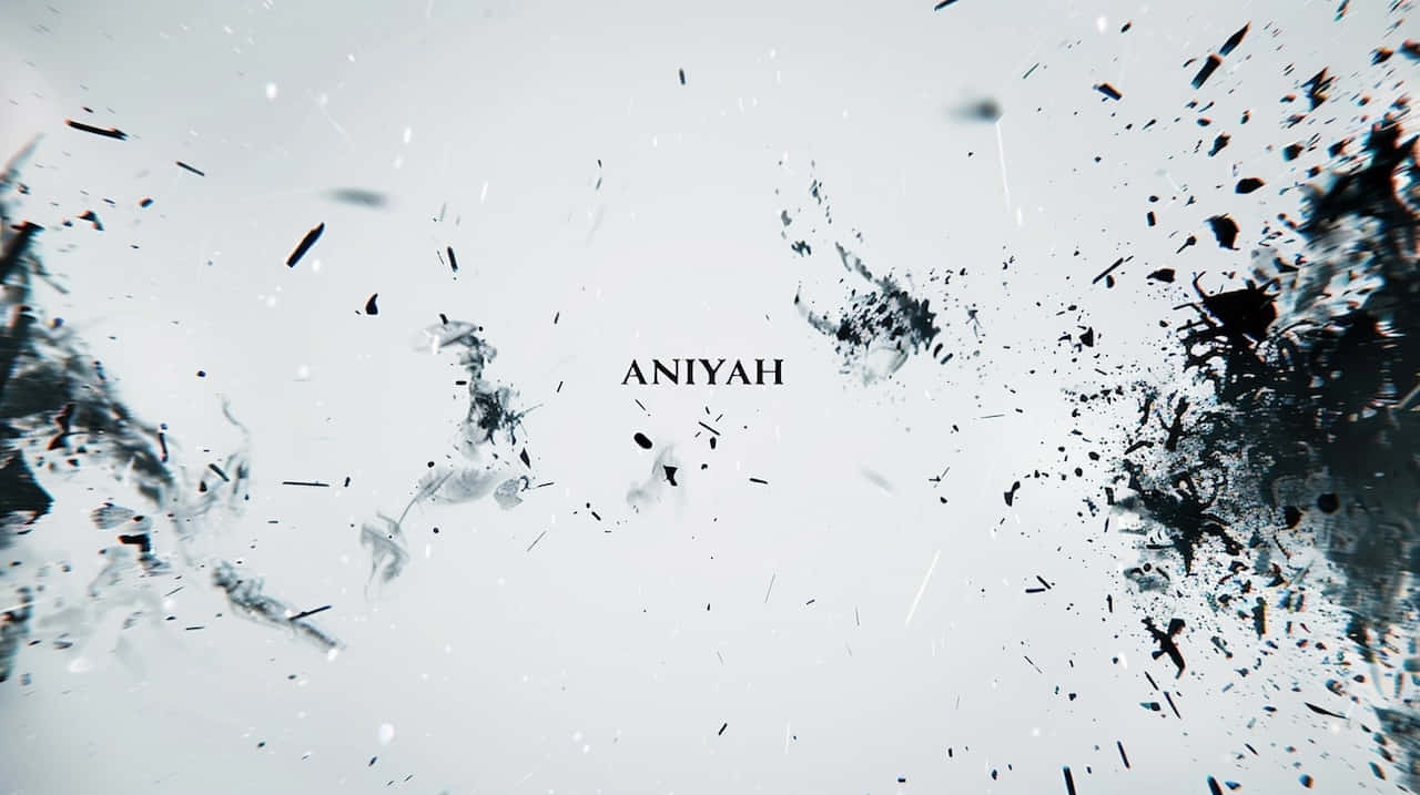  壁紙 — 名字Aniyah從純白背景上黑色墨水飛濺的動態爆炸中浮現。