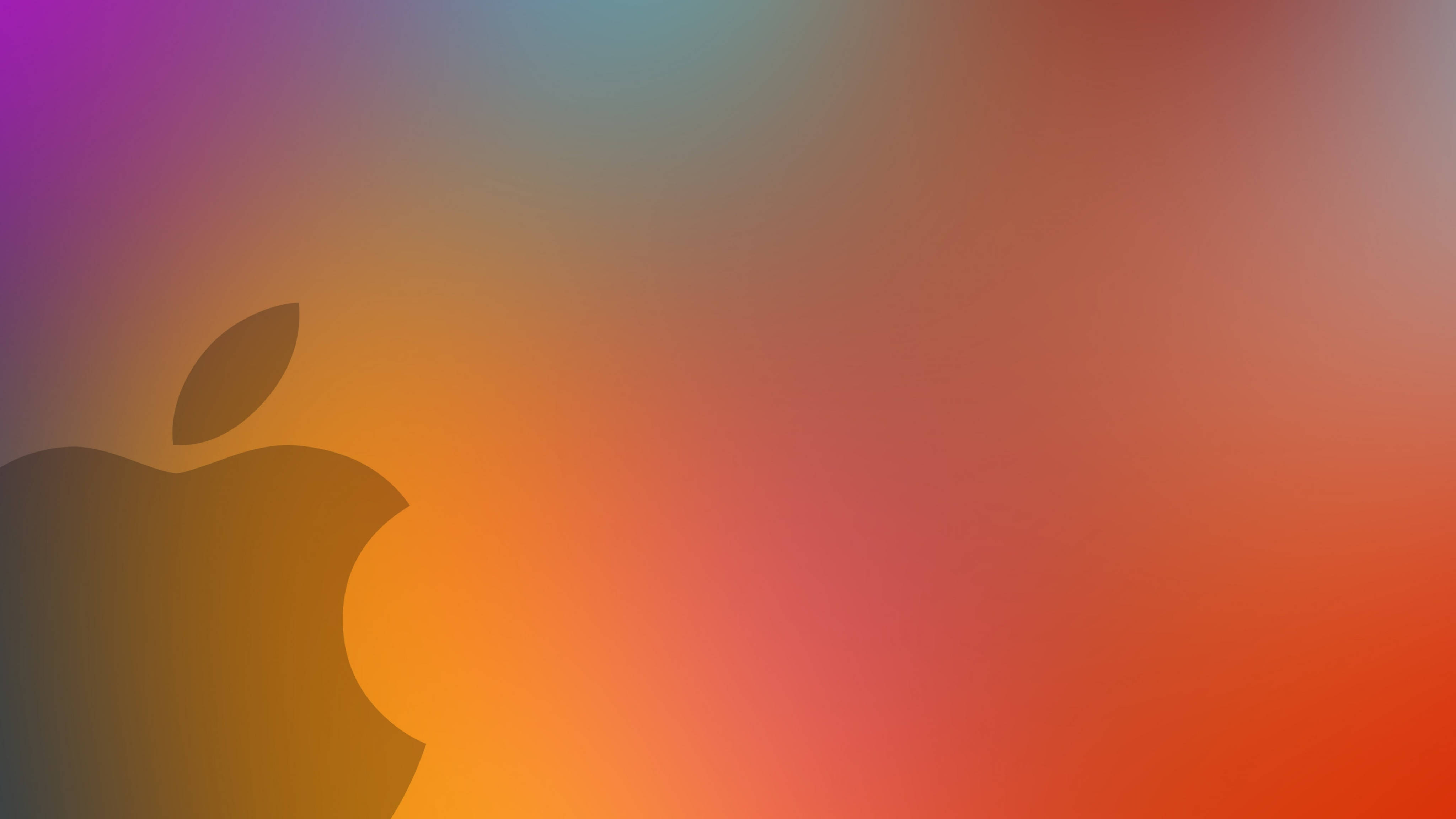 Apple 4K Ultra HD 桌布 壁紙 — Apple 標誌剪影，背景為混合紫色、橙色和紅色的鮮豔漸變色。