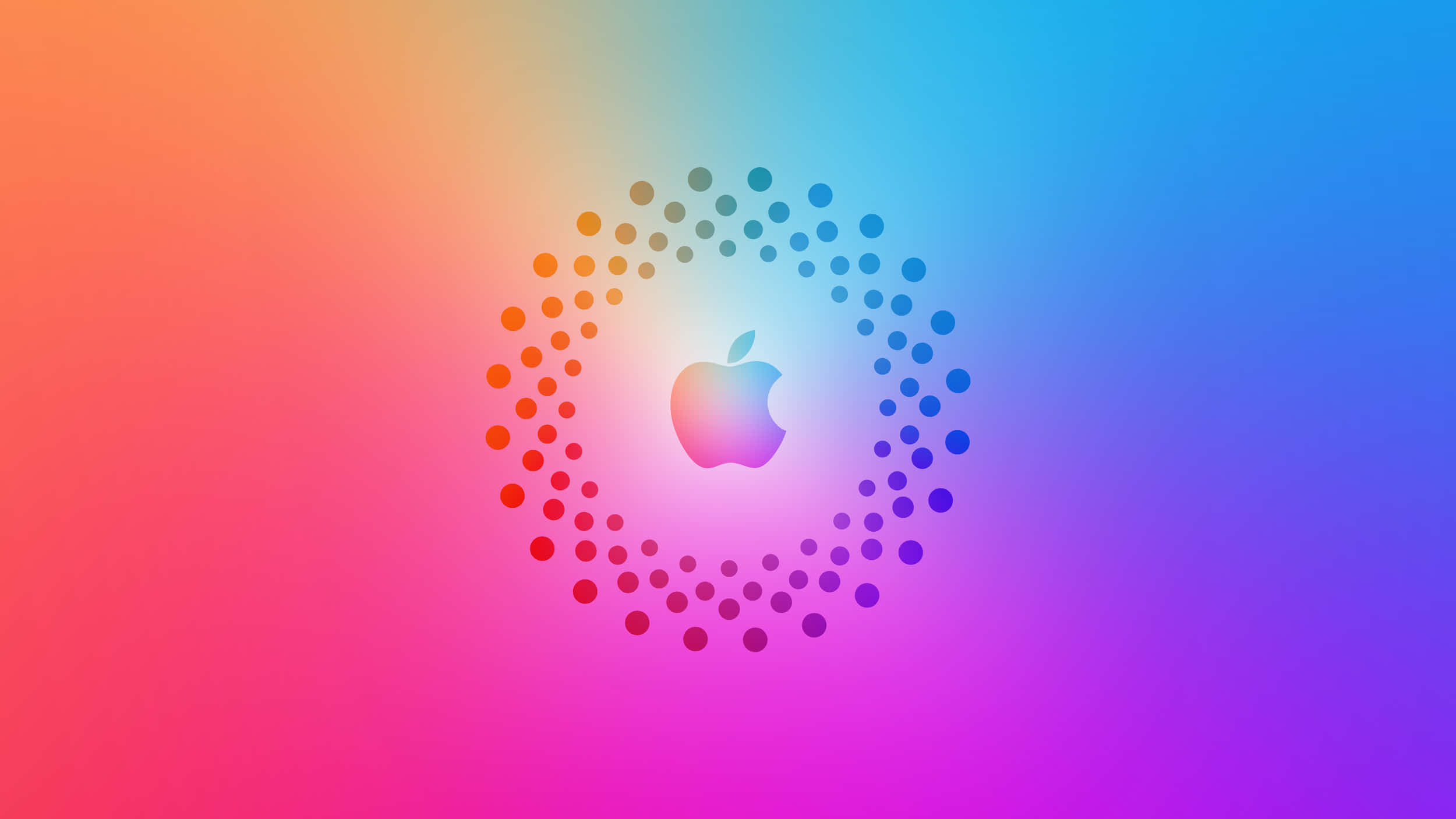 彩色動圖 桌布 壁紙 — Apple 標誌居中於發光的圓形點狀圖案中，背景為充滿活力的漸變色。