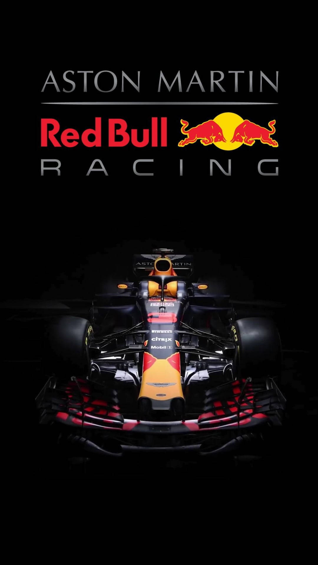  壁紙 — Aston Martin Red Bull Racing 一級方程式賽車在黑色背景下以戲劇性燈光照亮。