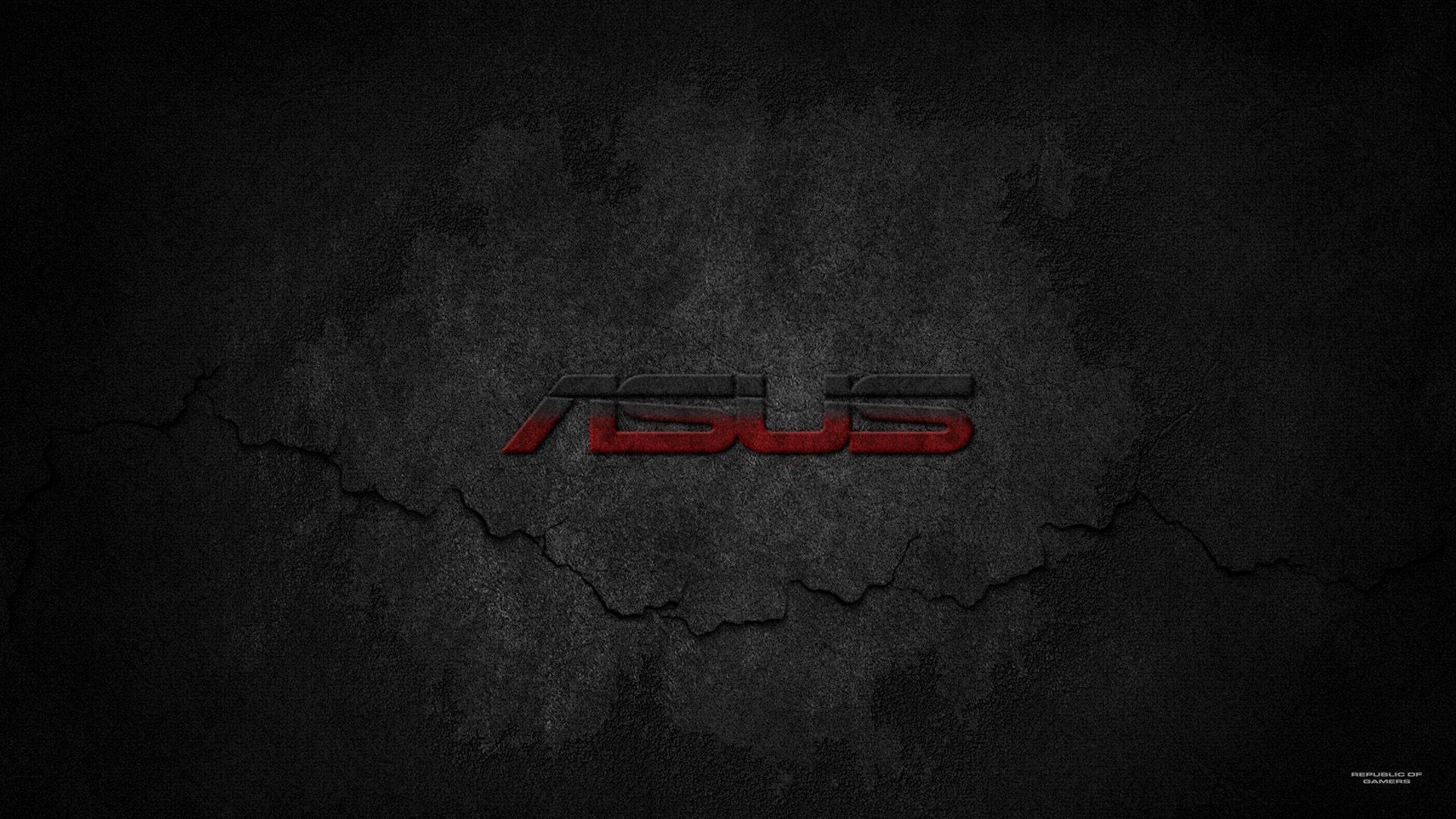 ASUS 桌布 壁紙 — ASUS 標誌以紅色金屬字體居中顯示在破裂的深灰色混凝土牆紋理上。
