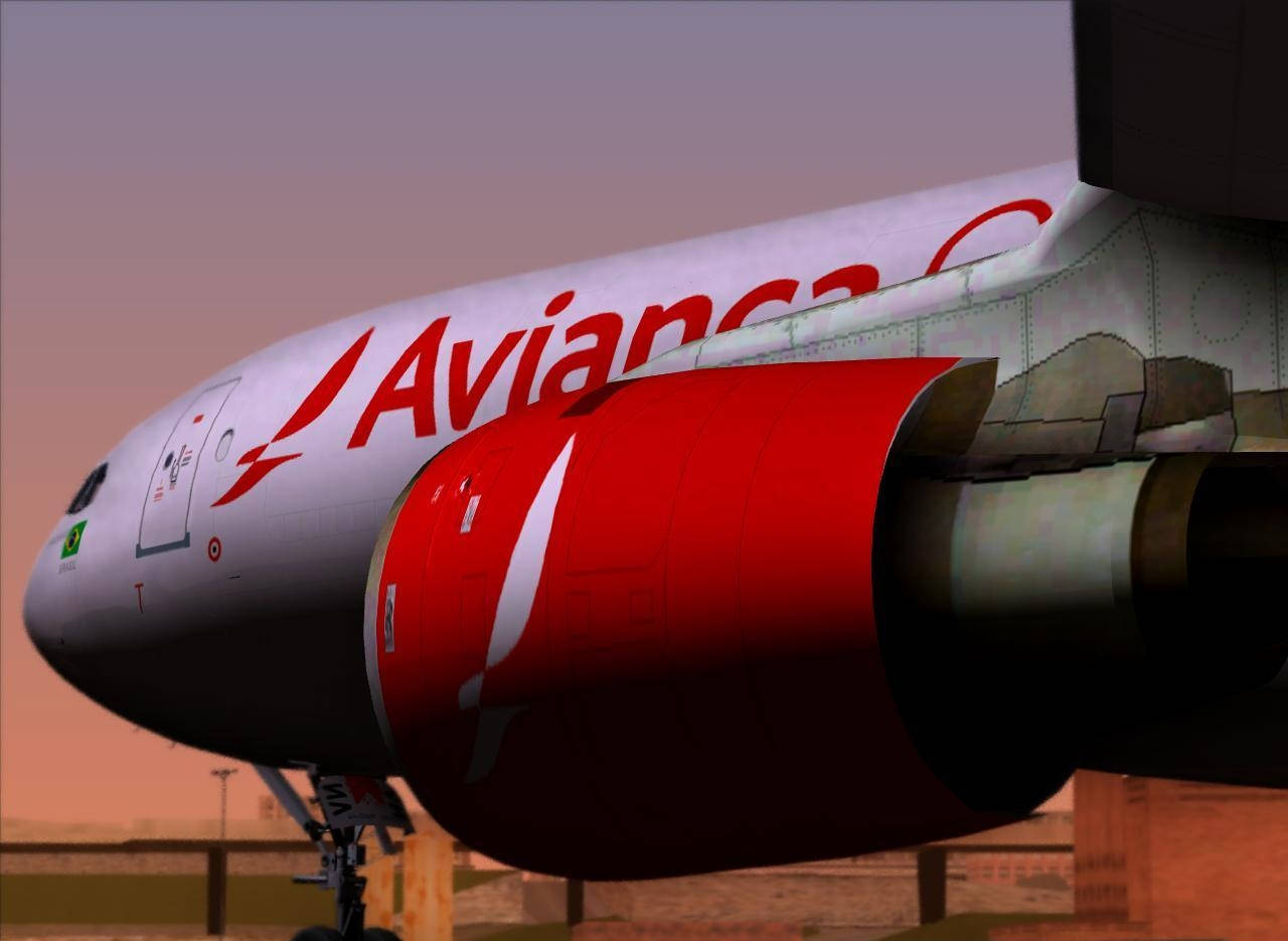 Plane 桌布 壁紙 — Avianca 飛機機身和引擎在黃昏時分的特寫，帶有溫暖的環境光線。