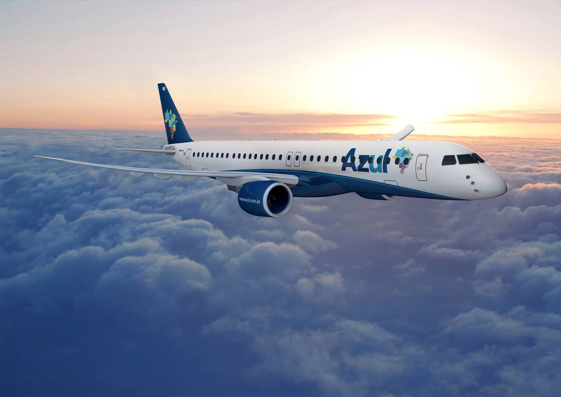  壁紙 — Azul Airlines 飛機在金色日出和柔和粉彩天空下翱翔於蓬鬆雲層之上。