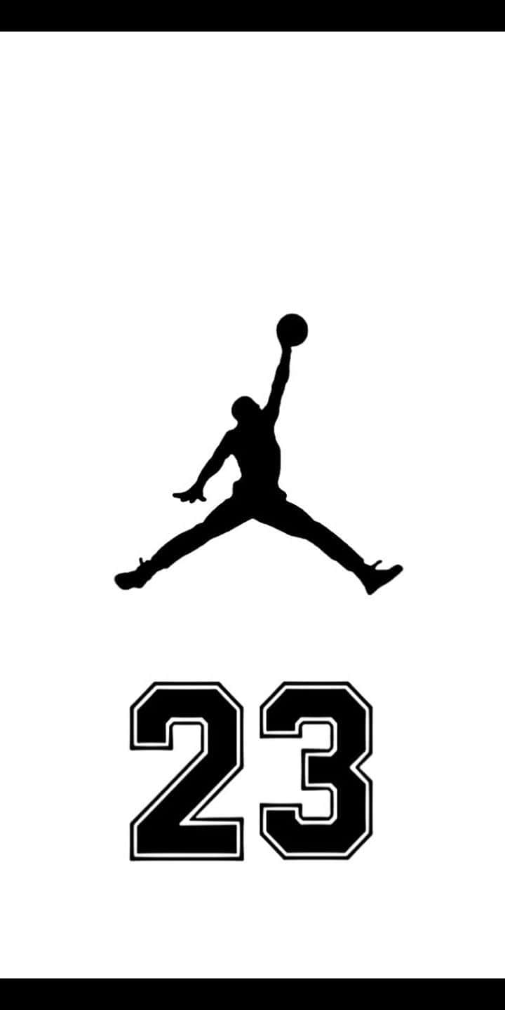 23號下方灌籃的籃球運動員黑色剪影。 — Air Jordan 壁紙