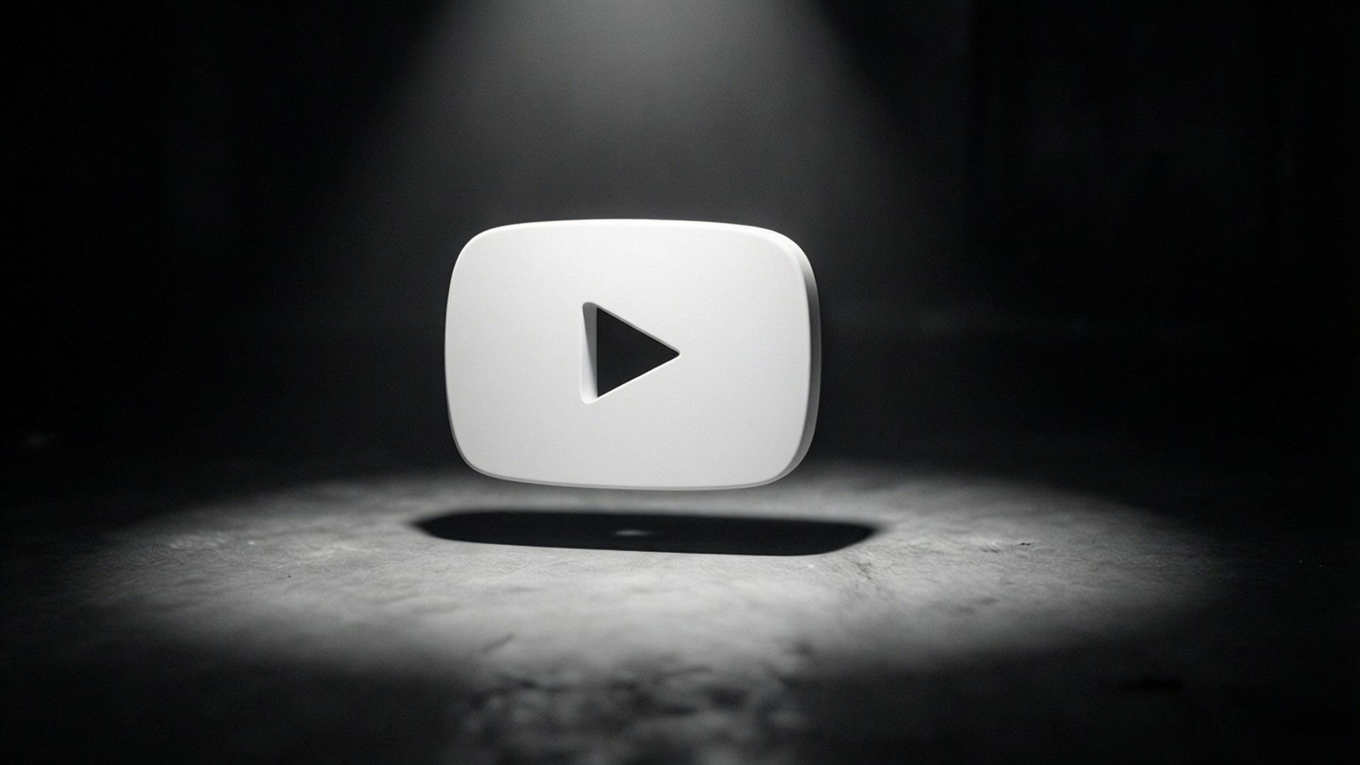 桌布 壁紙 — 一個白色YouTube播放按鈕圖示，在黑暗紋理地板上被聚光燈照亮。