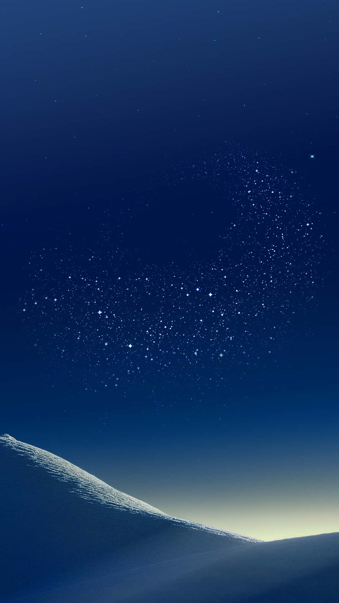  壁紙 — 白雪覆蓋的山脊在深藍色夜空下彎曲，夜空佈滿閃爍的星星。