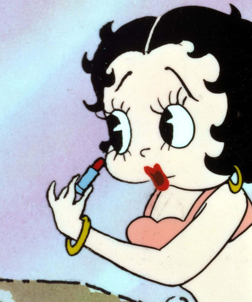 貝蒂娃娃 桌布 壁紙 — Betty Boop 用藍色唇膏管塗紅色唇膏，戴著金色耳環和粉紅色上衣。