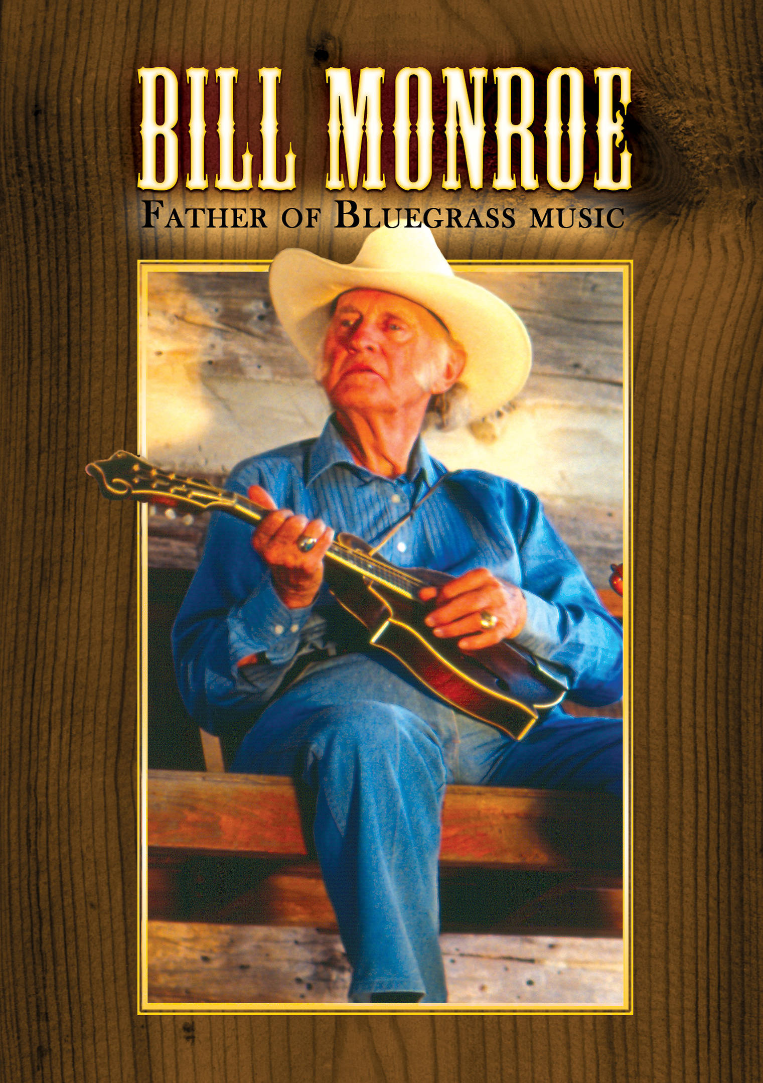 音樂 桌布 壁紙 — Bill Monroe，藍草音樂之父，坐在質樸的木背景前，手持曼陀林。